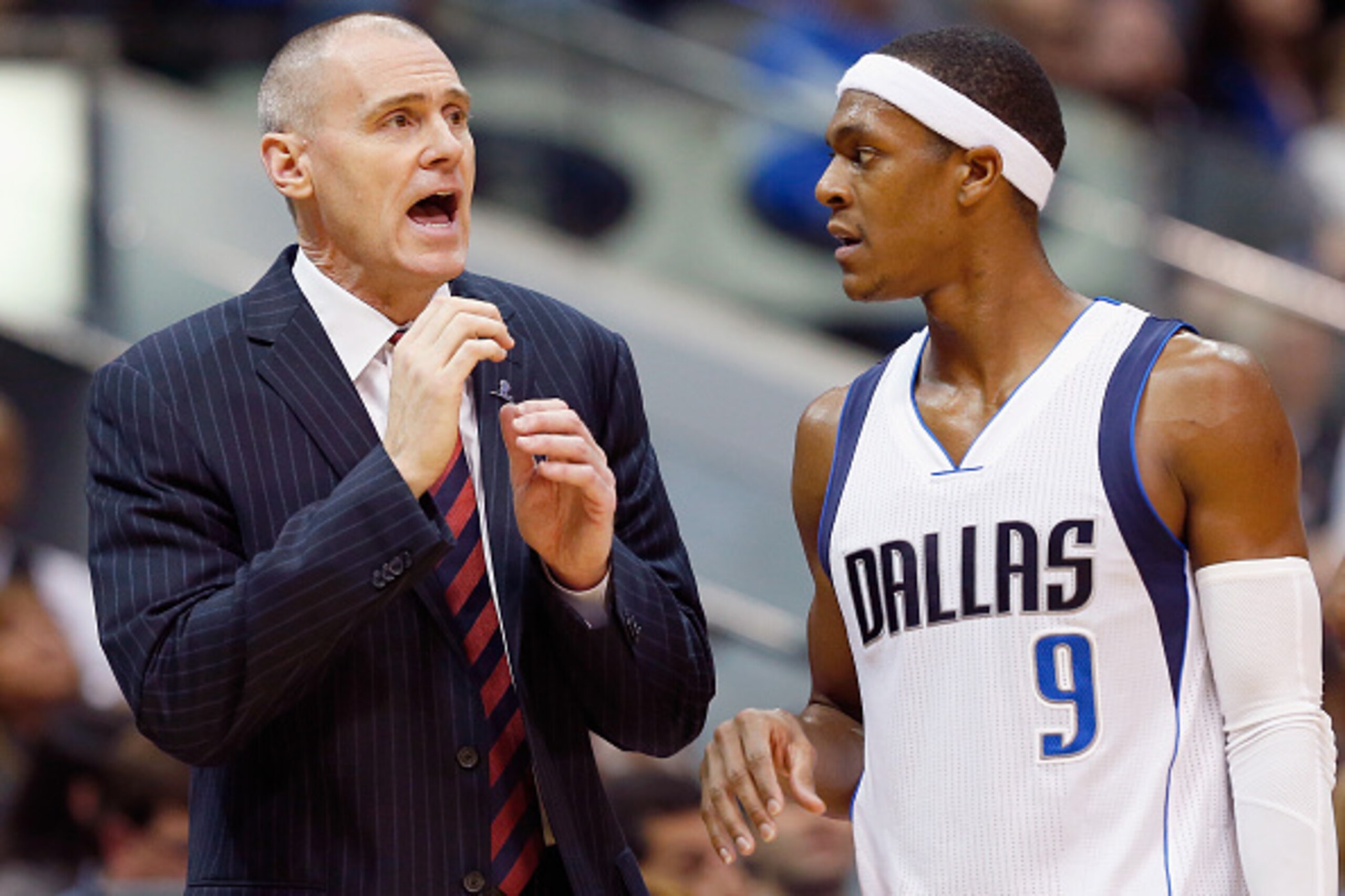 DALLAS, TX - DECEMBER 26:  Head coach Rick Carlisle of the Dallas Mavericks talks with Rajon Rondo #9 of the Dallas Mavericks as the Mavericks take on the Los Angeles Lakers at American Airlines Center on December 26, 2014 in Dallas, Texas. NOTE TO USER: 