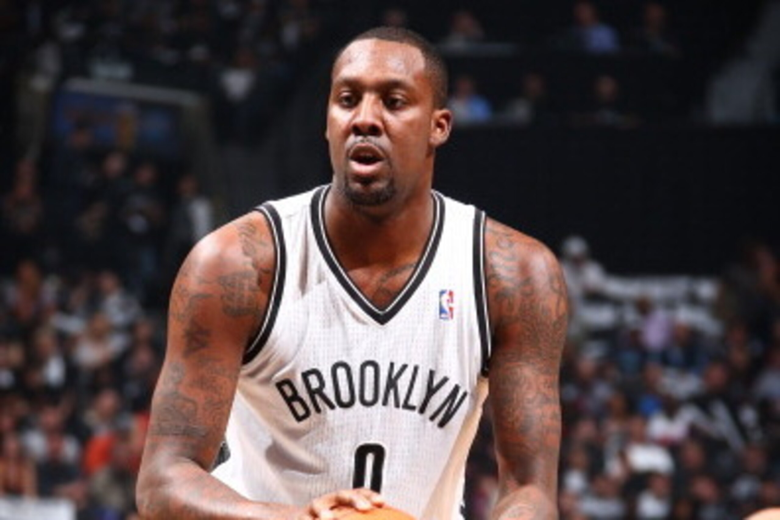 BROOKLYN, NY - APRIL 27: Andray Blatche #0 of the Brooklyn Nets shoots a foul shot against the Toronto Raptors during Game Four of the Eastern Conference Quarterfinals  at Barclays Center in Brooklyn. NOTE TO USER: User expressly acknowledges and agrees t
