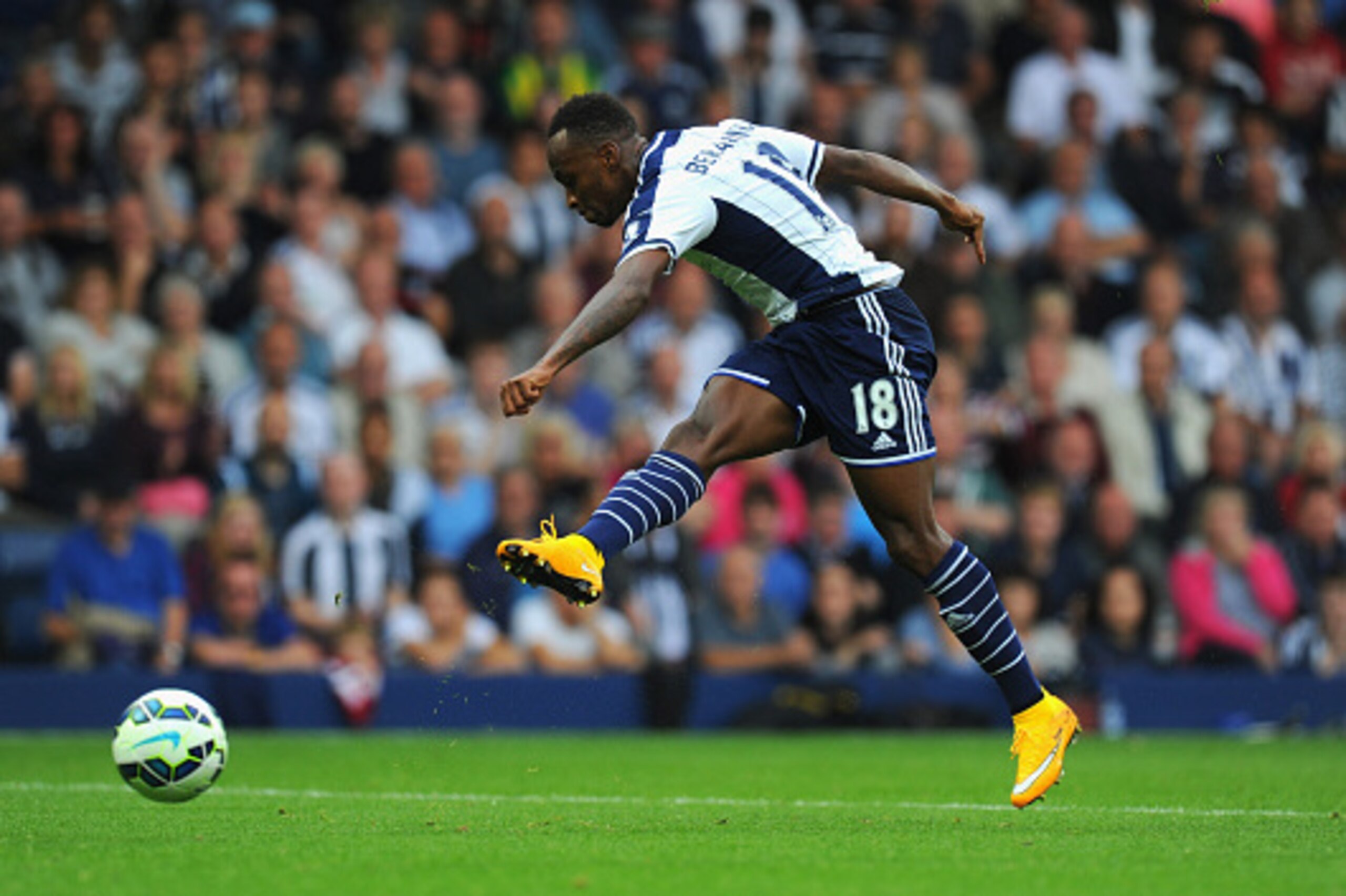 WEST BROMWICH, ENGLAND - SEPTEMBER 28:  WBA player Saido Berahino shoots to score the third goal during the Barclays Premier League match between West Bromwich Albion and Burnley at The Hawthorns on September 28, 2014 in West Bromwich, England.  (Photo by