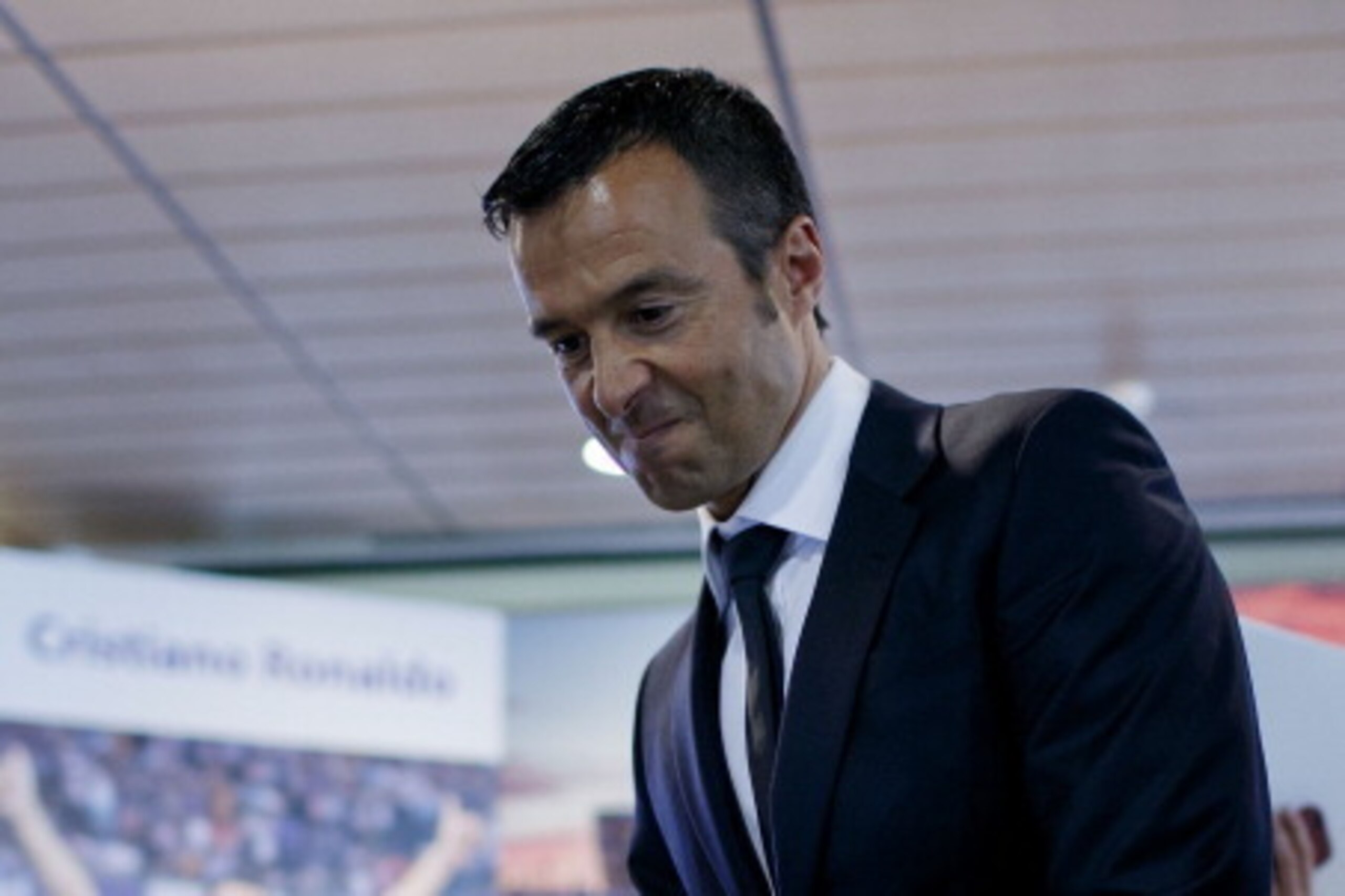 MADRID, SPAIN - SEPTEMBER 15:  Crsitiano Ronaldo«s agent Jorge Mendes takes seat prior to start the press conference after his signing contract renewal For Real Madrid at Estadio Santiago Bernabeu on September 15, 2013 in Madrid, Spain.  (Photo by Gonzalo