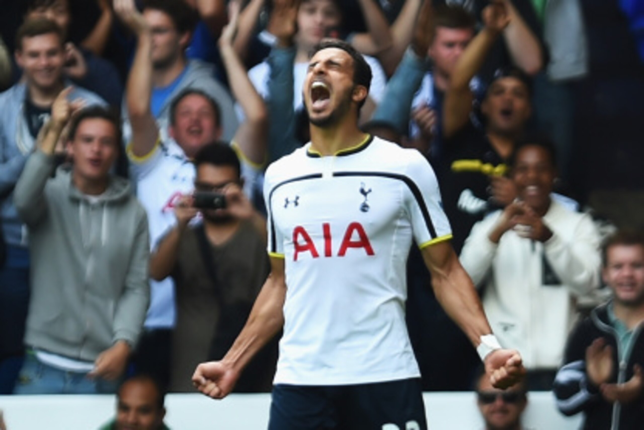 LONDON, ENGLAND - AUGUST 24: Nacer Chadli of Spurs celebrates scoring his second goal during the Barclays Premier League match between Tottenham Hotspur and Queens Park Rangers at White Hart Lane on August 24, 2014 in London, England.  (Photo by Jamie McD