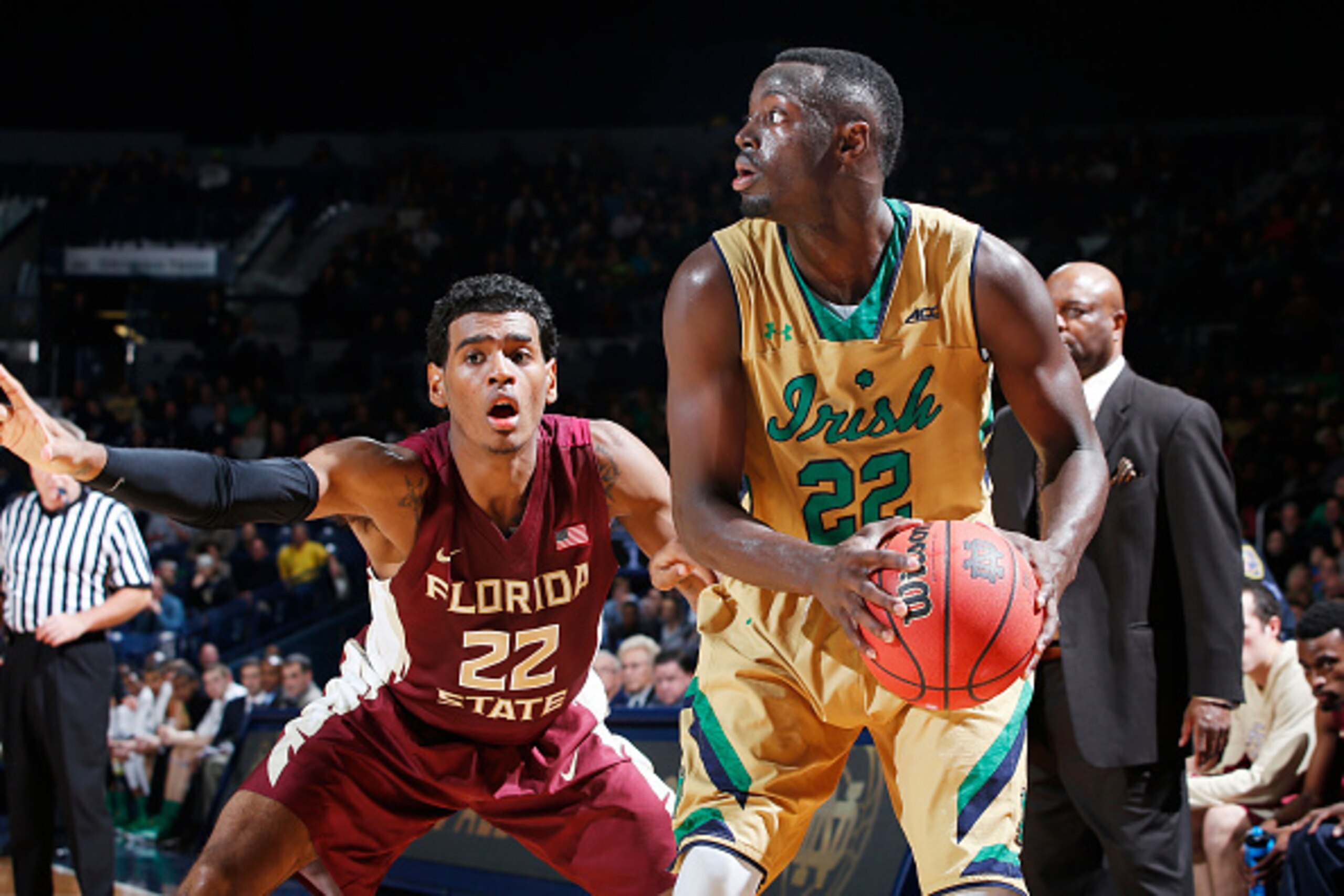 SOUTH BEND, IN - DECEMBER 13: Jerian Grant #22 of the Notre Dame Fighting Irish handles the ball against Xavier Rathan-Mayes #22 of the Florida State Seminoles during the game at Purcell Pavilion on December 13, 2014 in South Bend, Indiana. Notre Dame def