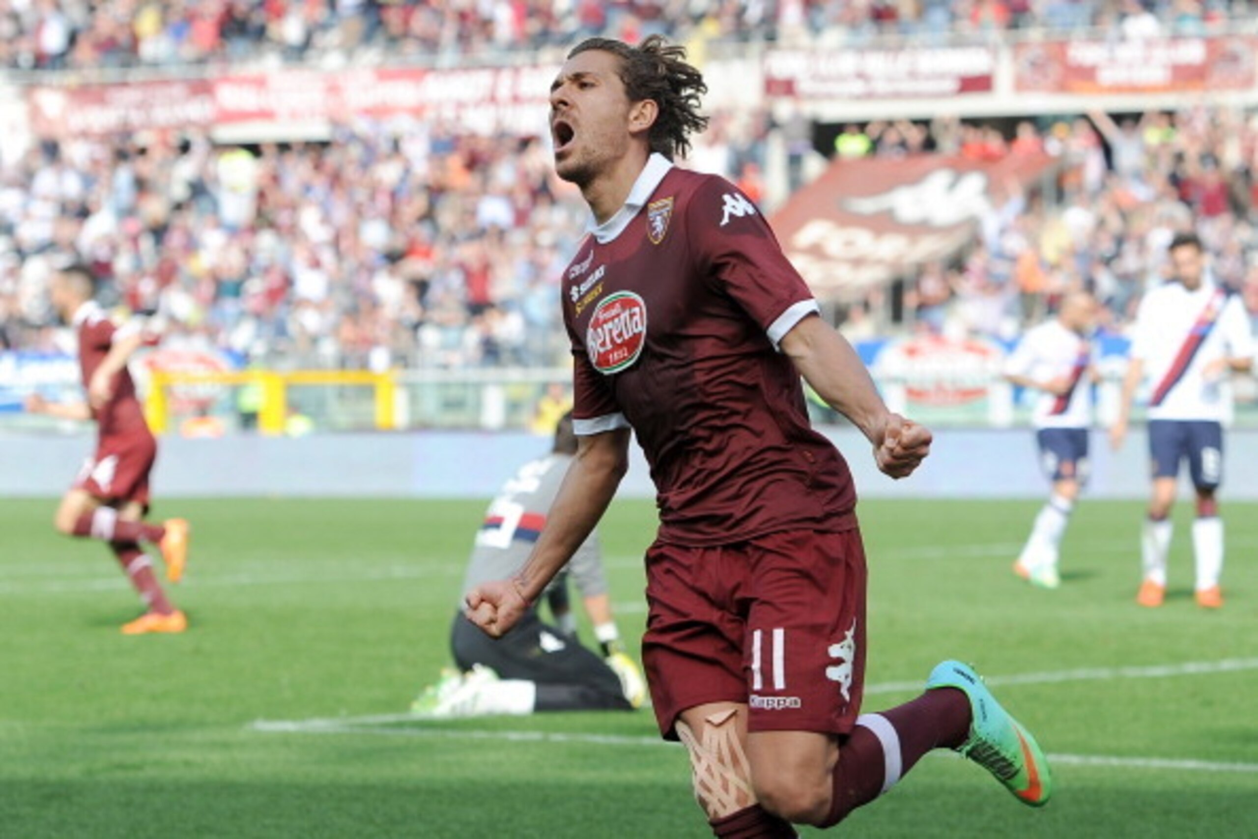 TURIN, ITALY - MARCH 30:  Alessio Cerci of Torino FC celebrates scoring their second goal during the Serie A match between Torino FC and Cagliari Calcio at Stadio Olimpico di Torino on March 30, 2014 in Turin, Italy.  (Photo by Valerio Pennicino/Getty Ima