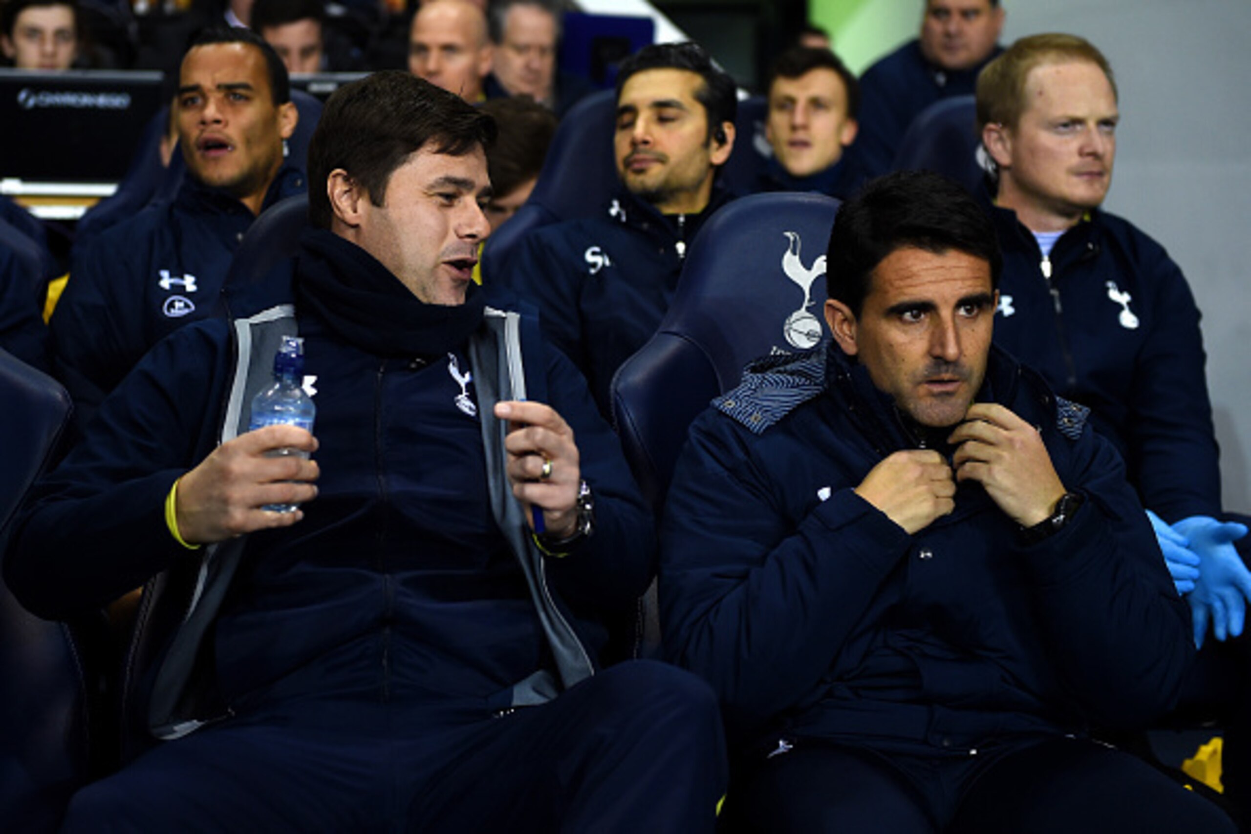 LONDON, ENGLAND - JANUARY 01:  Manager Mauricio Pochettino of Spurs speaks with assistant head coach Jesus Perez before the Barclays Premier League match between Tottenham Hotspur and Chelsea at White Hart Lane on January 1, 2015 in London, England.  (Pho