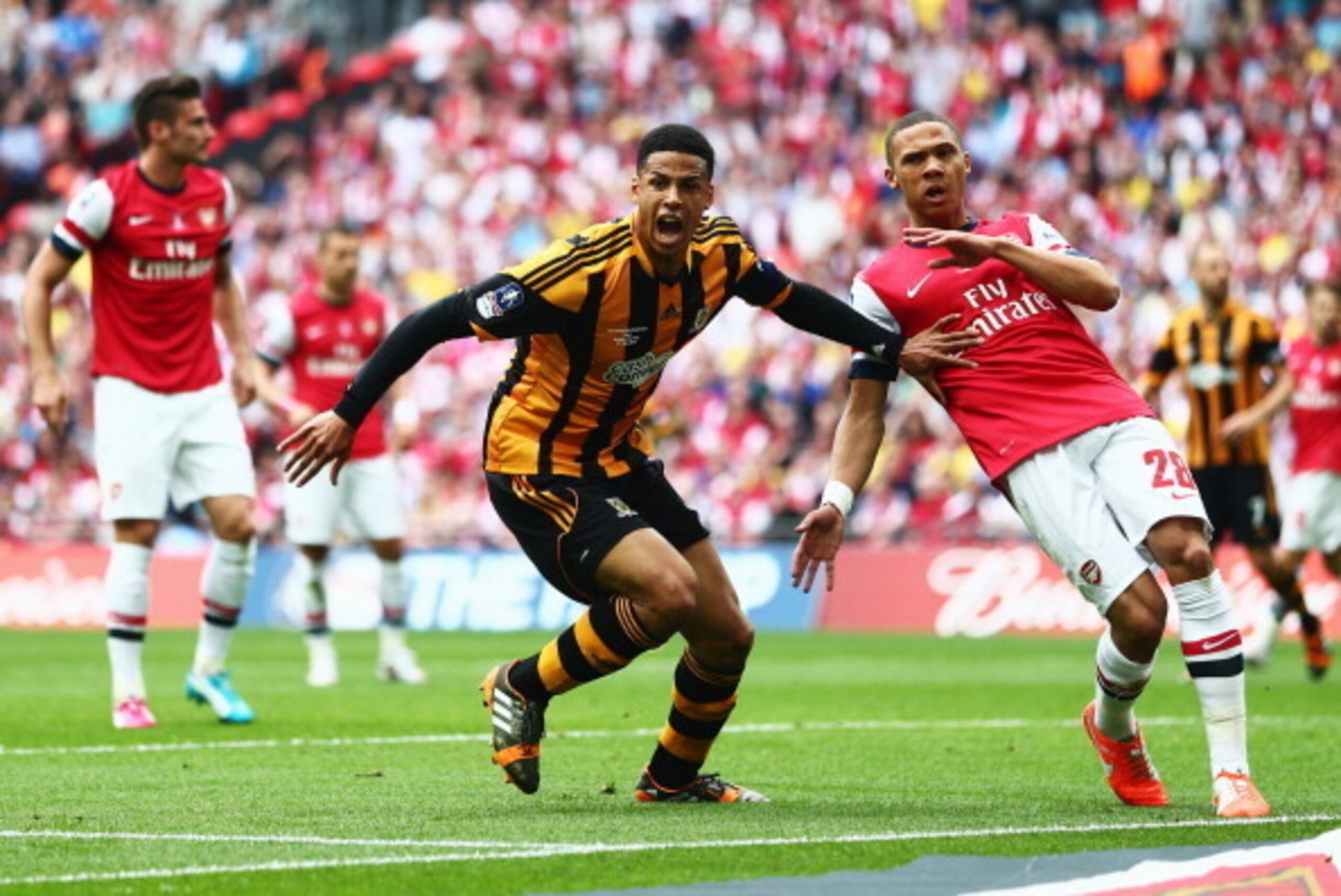 LONDON, ENGLAND - MAY 17:  Curtis Davies of Hull City celebrates as he scores their second goal during the FA Cup with Budweiser Final match between Arsenal and Hull City at Wembley Stadium on May 17, 2014 in London, England.  (Photo by Clive Mason/Getty 