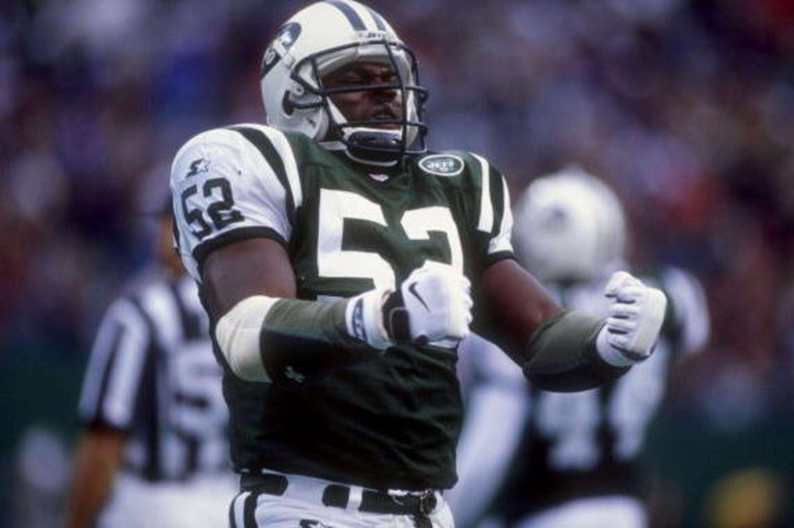 4 Oct 1998: Inside linebacker Pepper Johnson #52 of the New York Jets celebrates during a game against the Miami Dolphins at the Giants Stadium in East Rutherford, New Jersey. The Jets defeated the Dolphins 20-9. 4 Oct 1998: Inside linebacker Pepper Johnson #52 of the New York Jets celebrates during a game against the Miami Dolphins at the Giants Stadium in East Rutherford, New Jersey. The Jets defeated the Dolphins 20-9.