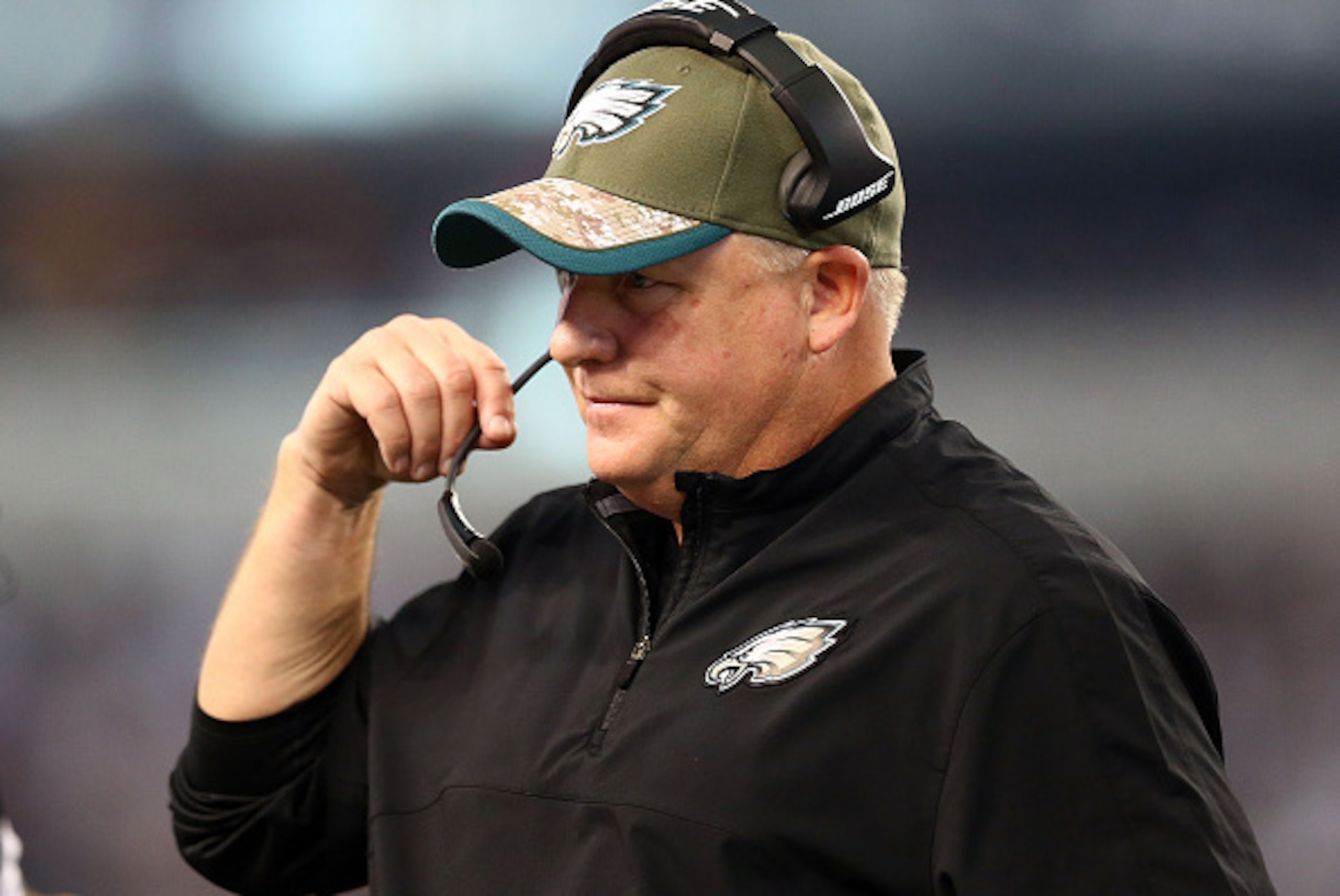 ARLINGTON, TX - NOVEMBER 27:  Head coach Chip Kelly of the Philadelphia Eagles watches from the sideline in the first half against the Dallas Cowboys at AT&T Stadium on November 27, 2014 in Arlington, Texas.  (Photo by Ronald Martinez/Getty Images)