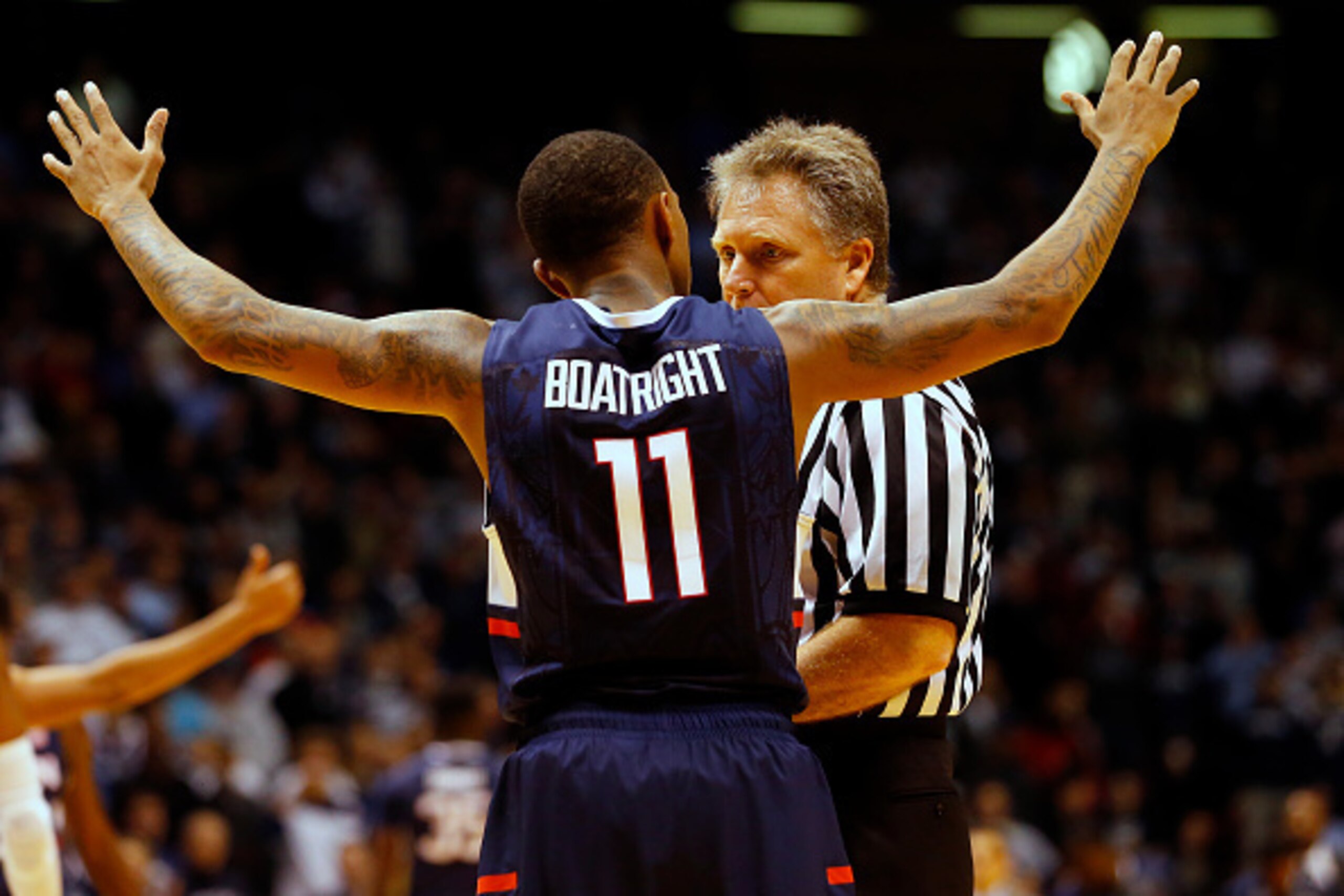 EAST RUTHERFORD, NJ - DECEMBER 18: Ryan Boatright #11 of the Connecticut Huskies questions a call by the referee during the second half against the Duke Blue Devils in an NCAA college basketball game on December 18, 2014 at the Izod Center in East Rutherf