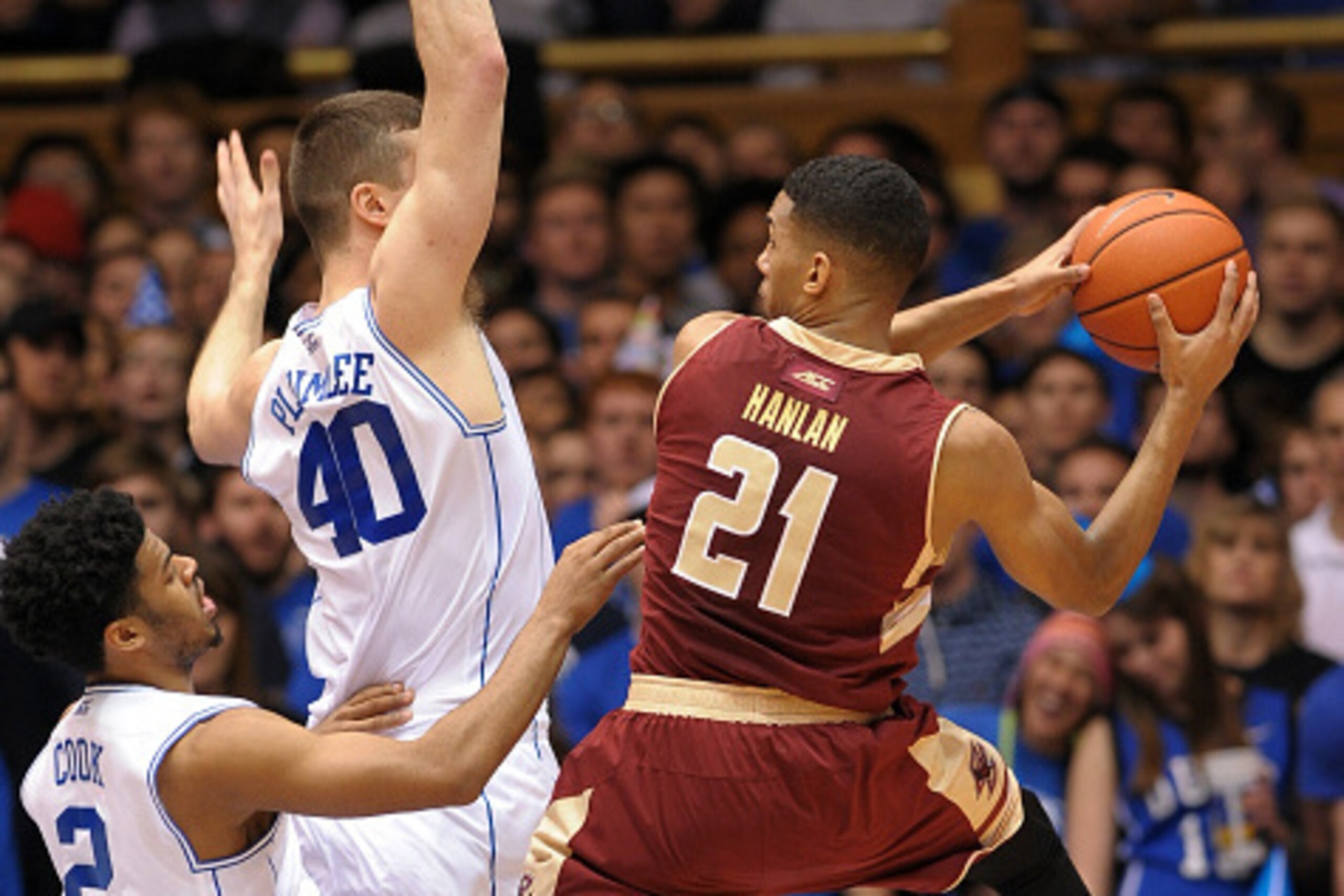 DURHAM, NC - JANUARY 03: Quinn Cook #2 and Marshall Plumlee #40 of the Duke Blue Devils defend Olivier Hanlan #21 of the Boston College Eagles during their game at Cameron Indoor Stadium on January 3, 2015 in Durham, North Carolina. (Photo by Lance King/G