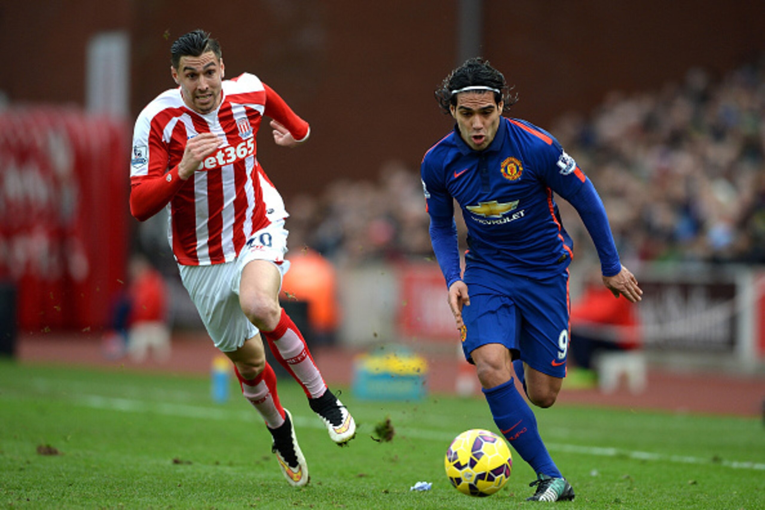 STOKE ON TRENT, ENGLAND - JANUARY 01:  Radamel Falcao of Manchester United competes with Marko Arnautovic of Stoke City during the Barclays Premier League match between Stoke City and Manchester United at Britannia Stadium on January 1, 2015 in Stoke on T
