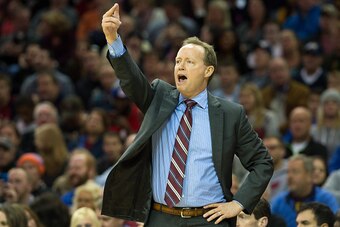 CLEVELAND, OH - NOVEMBER 15: Mike Budenholzer of the Atlanta Hawks yells to his players during the first half against the Cleveland Cavaliers at Quicken Loans Arena on November 15, 2014 in Cleveland, Ohio. NOTE TO USER: User expressly acknowledges and agr