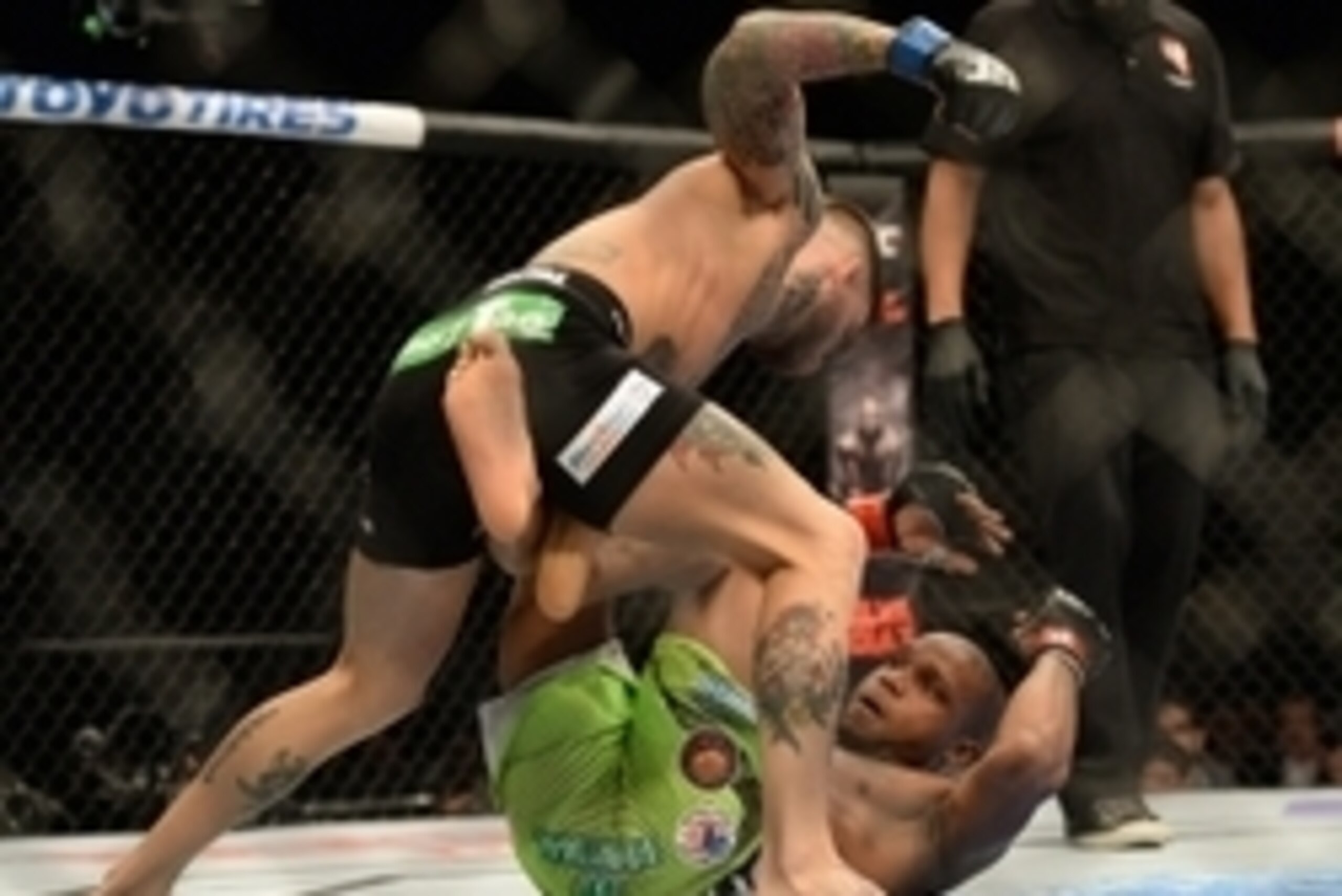 Jan 3, 2015; Las Vegas, NV, USA; Cody Garbrandt (blue gloves) and Marcus Brimage (red gloves) compete in their bantamweight bout at UFC 182 at MGM Grand Garden Arena. Mandatory Credit: Jayne Kamin-Oncea-USA TODAY Sports