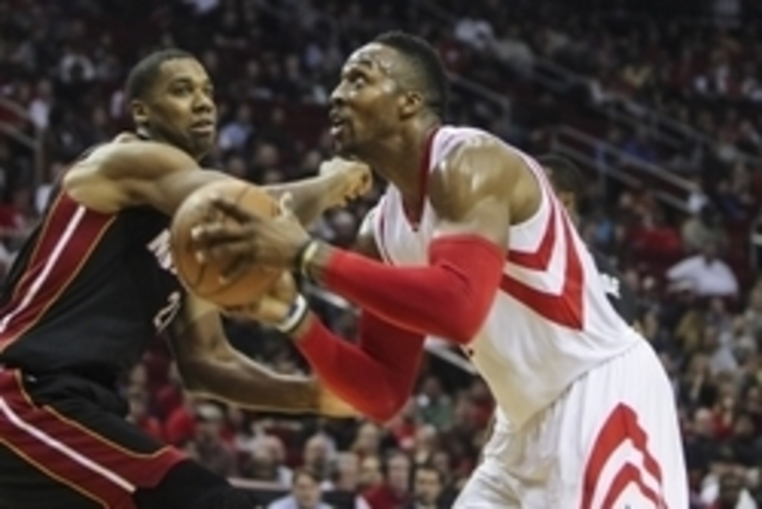 Jan 3, 2015; Houston, TX, USA; Houston Rockets center Dwight Howard (12) drives to the basket during the second quarter against the Miami Heat at Toyota Center. Mandatory Credit: Troy Taormina-USA TODAY Sports