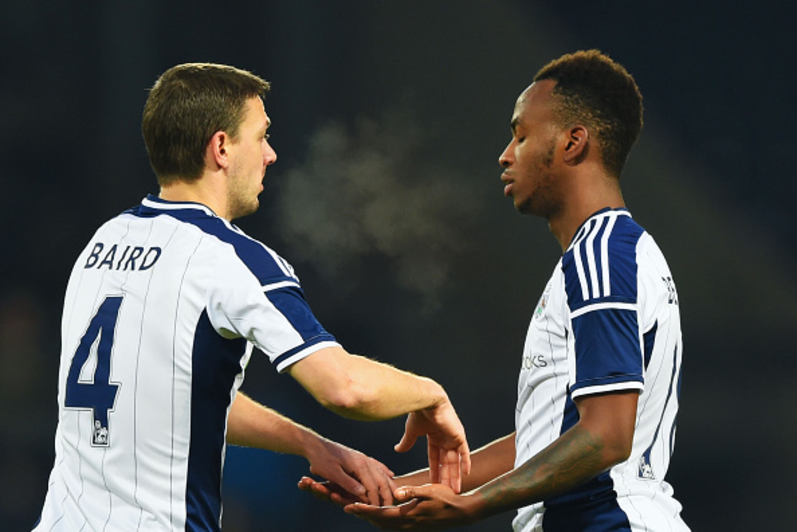 WEST BROMWICH, ENGLAND - JANUARY 03:  Saido Berahino of West Bromwich Albion (R) celebrates with Chris Baird as he scores their fourth goal and completes his hat-trick during the FA Cup Third Round match between West Bromwich Albion and Gateshead at The H
