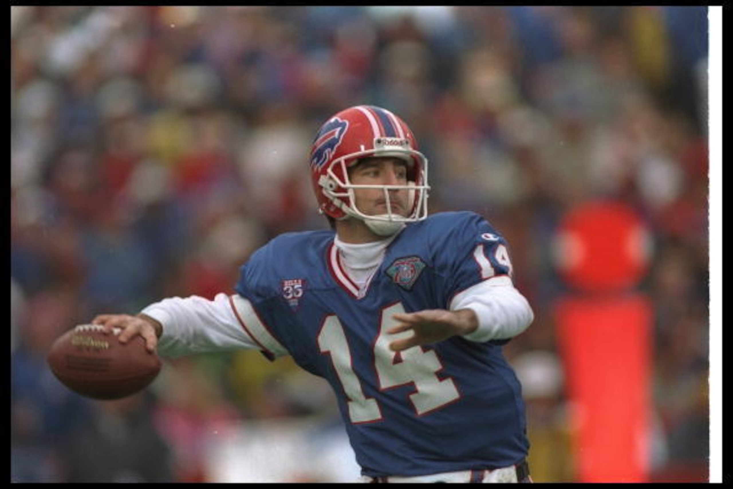 18 Dec 1994: Quarterback Frank Reich of the Buffalo Bills looks to pass the ball during a game against the New England Patriots at Rich Stadium in Orchard Park, New York. The Patriots won the game, 41-17.