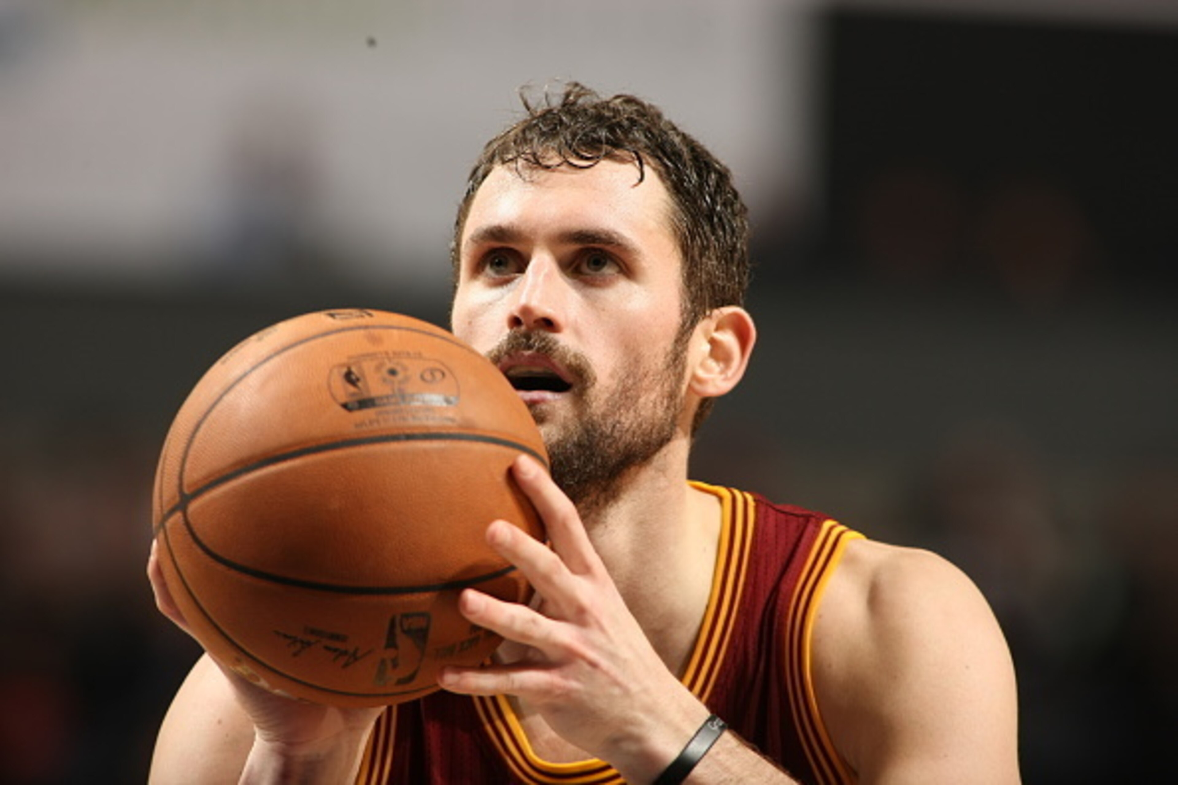 CHARLOTTE, NC - JANUARY 2: Kevin Love #0 of the Cleveland Cavaliers shoots a free throw against the Charlotte Hornets during the game at the Time Warner Cable Arena on January 2, 2015 in Charlotte, North Carolina. NOTE TO USER: User expressly acknowledge CHARLOTTE, NC - JANUARY 2: Kevin Love #0 of the Cleveland Cavaliers shoots a free throw against the Charlotte Hornets during the game at the Time Warner Cable Arena on January 2, 2015 in Charlotte, North Carolina. NOTE TO USER: User expressly acknowledge