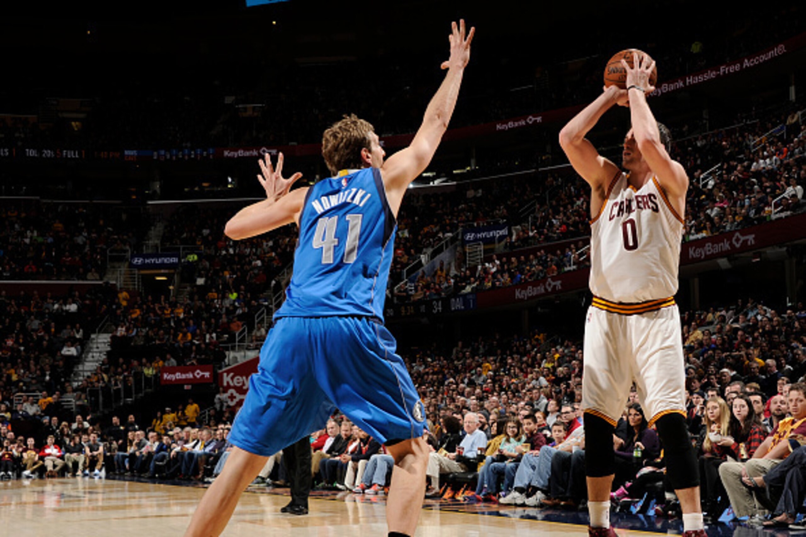CLEVELAND, OH - JANUARY 4: Kevin Love #0 of the Cleveland Cavaliers takes a shot against the Dallas Mavericks on January 4, 2015 at Quicken Loans Arena in Cleveland, Ohio. NOTE TO USER: User expressly acknowledges and agrees that, by downloading and/or us
