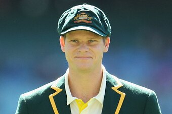 MELBOURNE, AUSTRALIA - DECEMBER 26:  Steven Smith, captain of Australia looks on after winning the toss during day one of the Third Test match between Australia and India at Melbourne Cricket Ground on December 26, 2014 in Melbourne, Australia.  (Photo by