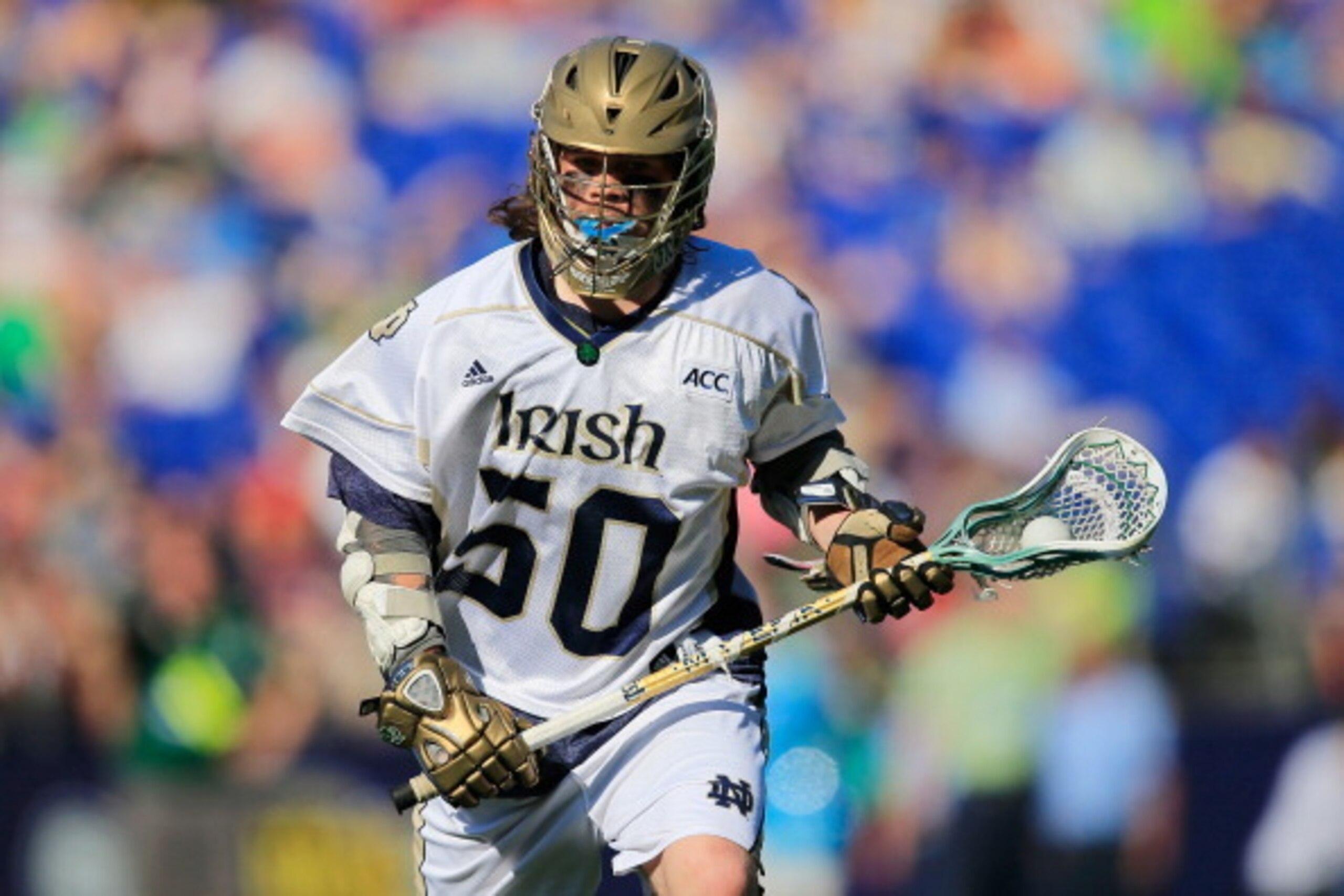 BALTIMORE, MD - MAY 24:  Matt Kavanagh #50 of the Notre Dame Fighting Irish cradles the ball while looking to pass against the Maryland Terrapins in the second half during the semifinals of the 2014 NCAA Division I Men's Lacrosse Championship at M&T Bank 