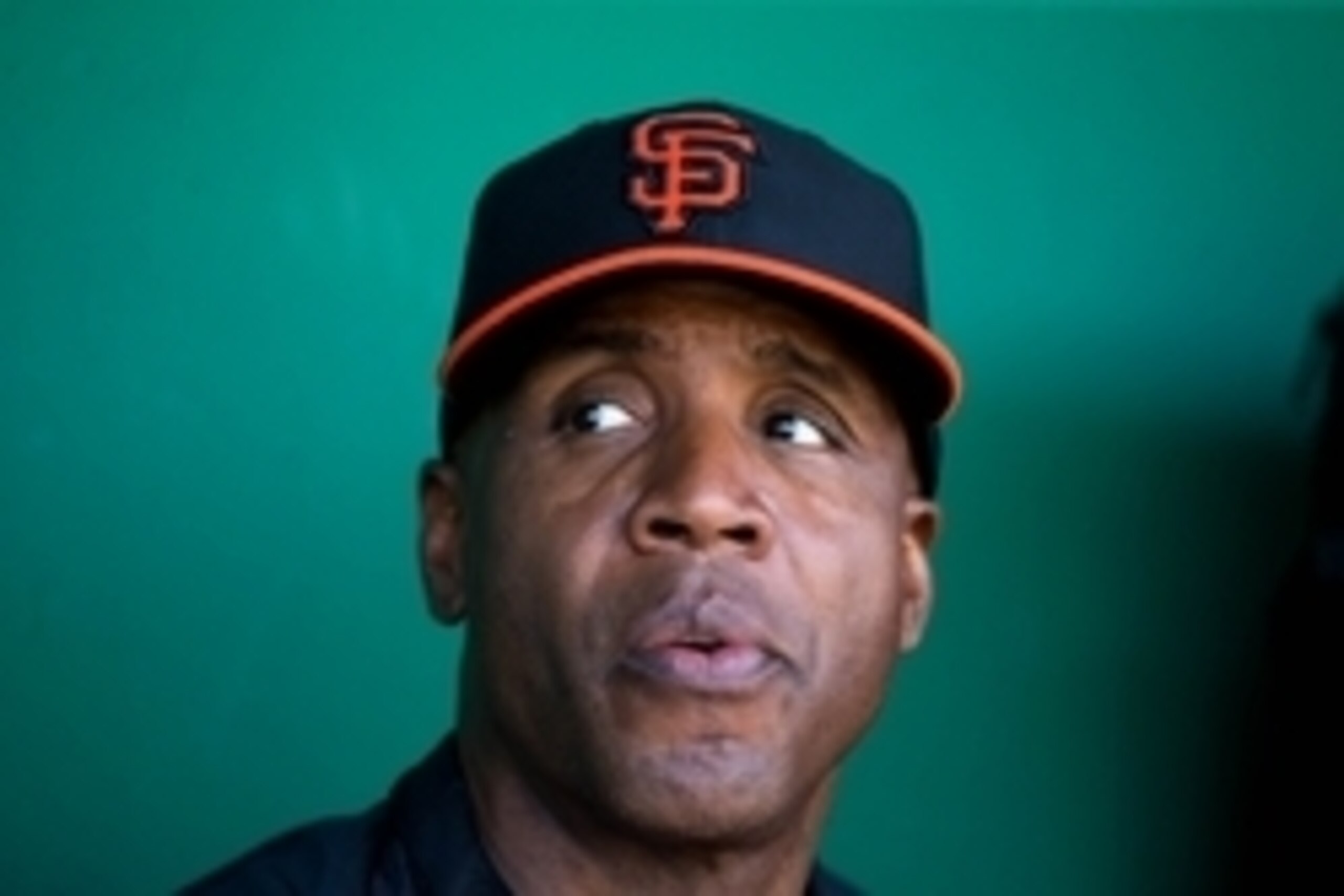 Mar 10, 2014; Scottsdale, AZ, USA; San Francisco Giants former outfielder Barry Bonds in the dugout prior to the game against the Chicago Cubs at Scottsdale Stadium. Mandatory Credit: Mark J. Rebilas-USA TODAY Sports