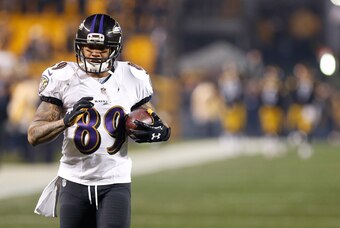 Jan 3, 2015; Pittsburgh, PA, USA; Baltimore Ravens wide receiver Steve Smith (89) runs with the ball prior to the 2014 AFC Wild Card playoff football game against the Pittsburgh Steelers at Heinz Field. Mandatory Credit: Geoff Burke-USA TODAY Sports