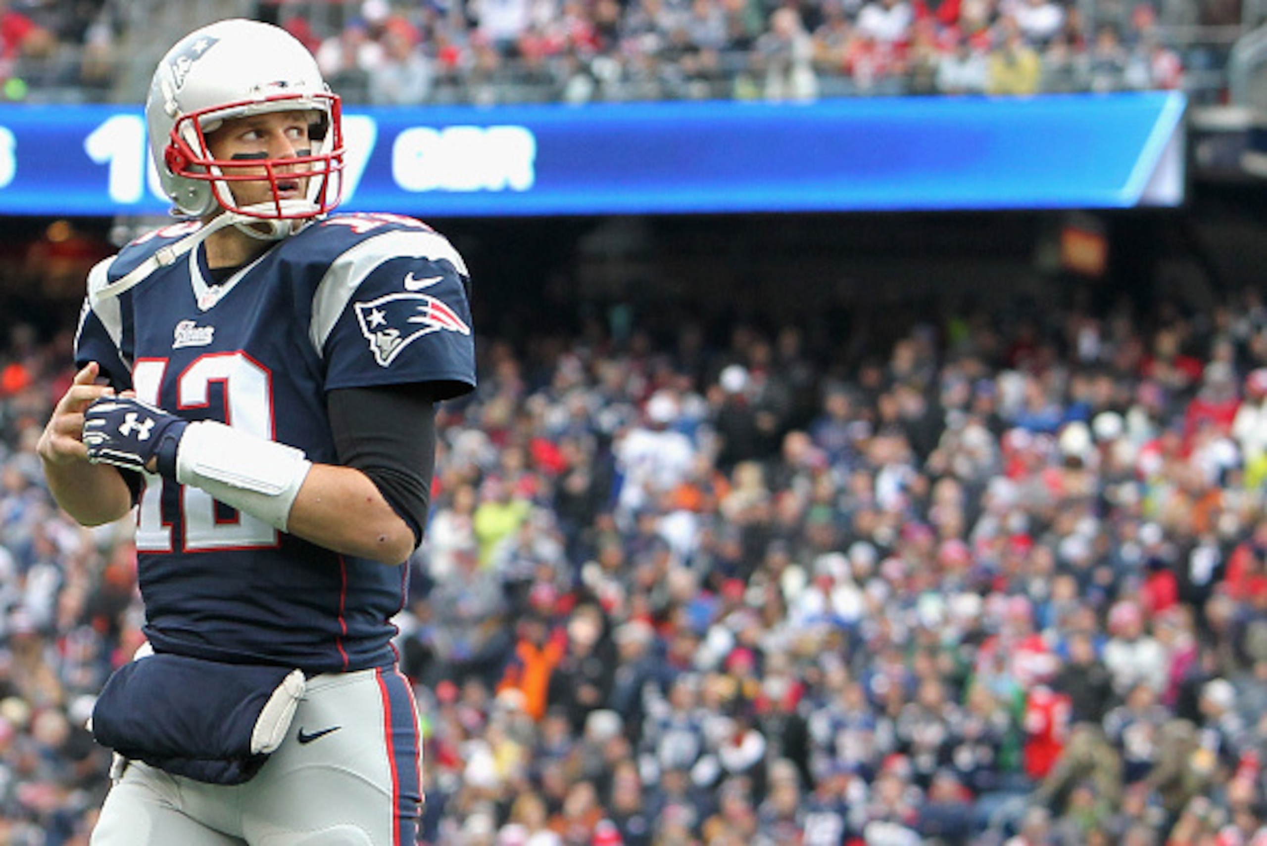 FOXBORO, MA - DECEMBER 28:  Tom Brady #12 of the New England Patriots reacts during the second quarter against the Buffalo Bills at Gillette Stadium on December 28, 2014 in Foxboro, Massachusetts.  (Photo by Jim Rogash/Getty Images)