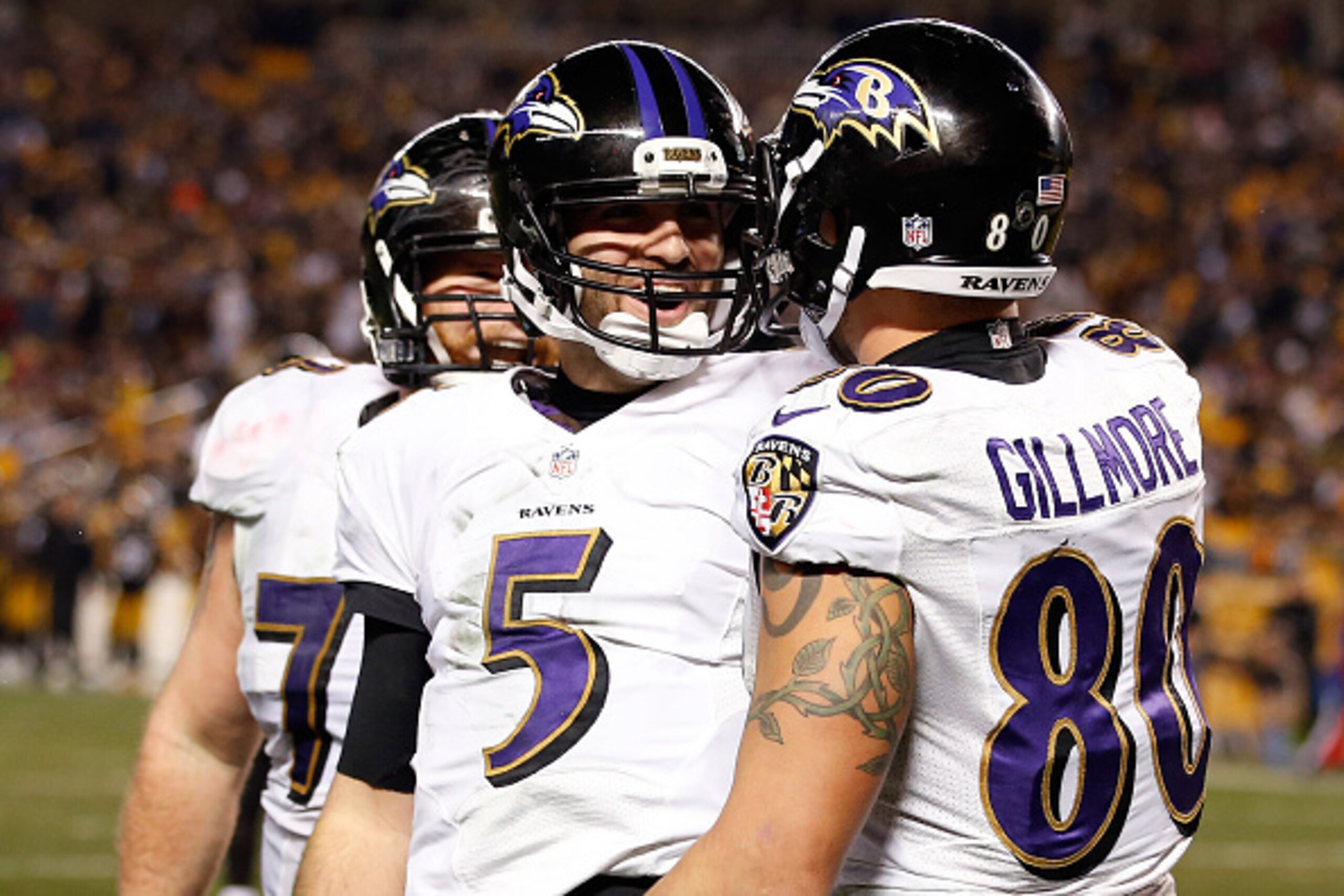PITTSBURGH, PA - JANUARY 03:  Crockett Gillmore #80 celebrates a fourth quarter touchdown with Joe Flacco #5 of the Baltimore Ravens against the Pittsburgh Steelers during their AFC Wild Card game at Heinz Field on January 3, 2015 in Pittsburgh, Pennsylva