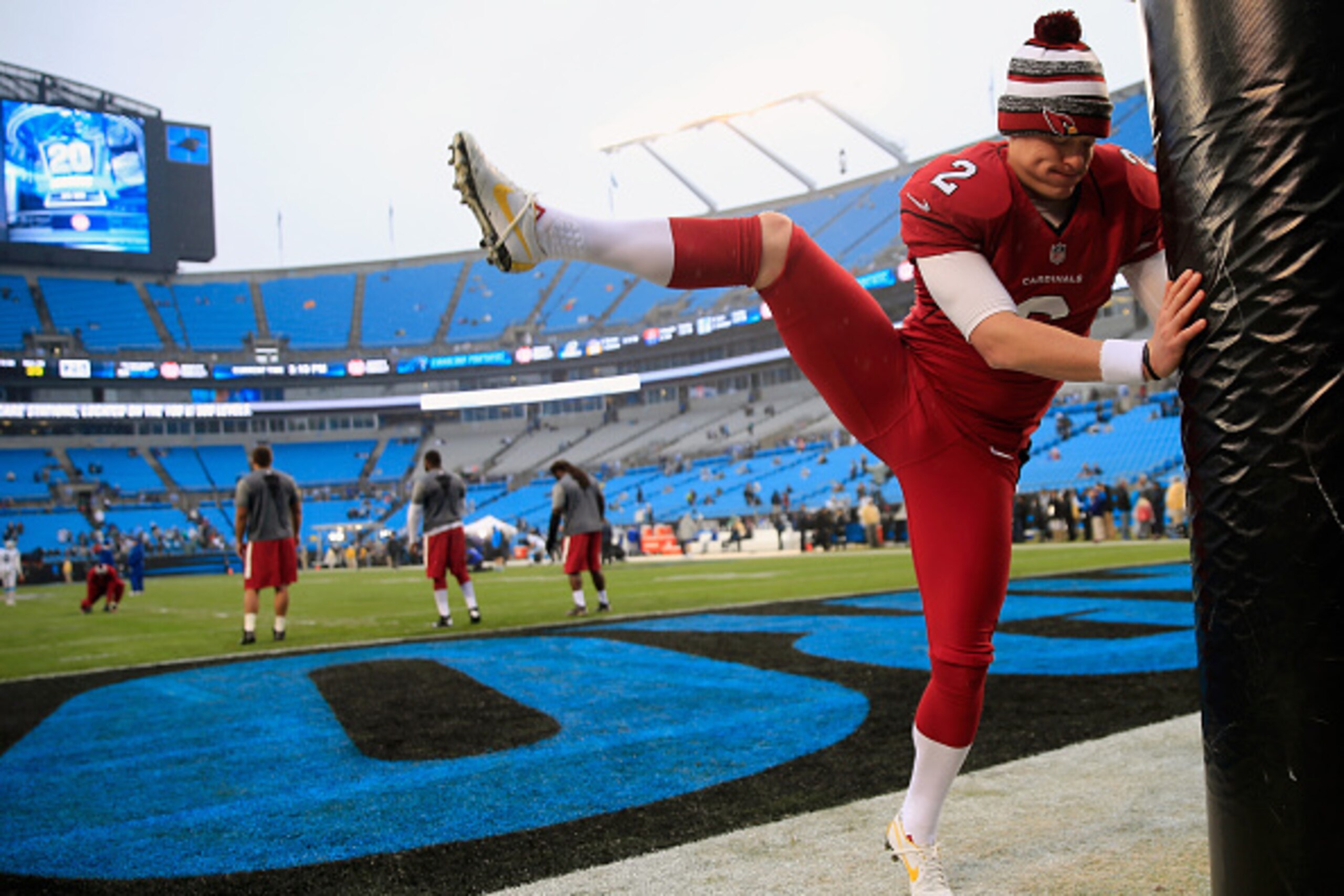 CHARLOTTE, NC - JANUARY 03:   Drew Butler #2 of the Arizona Cardinals stretches prior to the NFC Wild Card Playoff game against the Carolina Panthers at Bank of America Stadium on January 3, 2015 in Charlotte, North Carolina.  (Photo by Rob Carr/Getty Ima