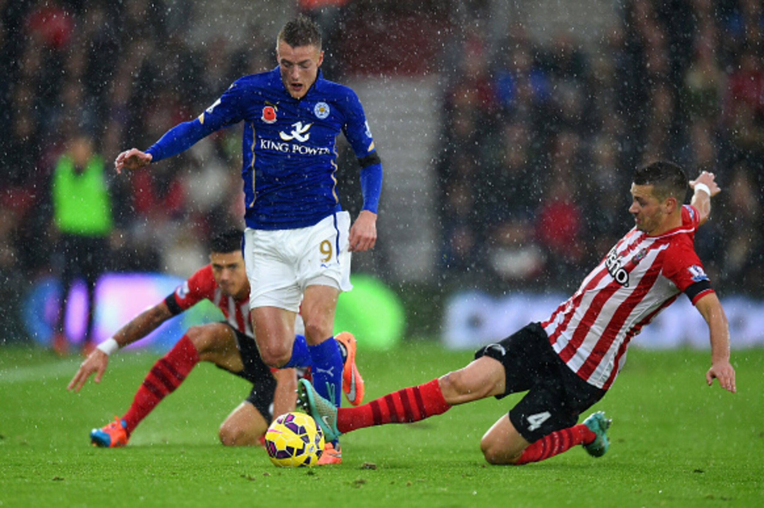 SOUTHAMPTON, ENGLAND - NOVEMBER 08: Morgan Schneiderlin of Southampton tackles Jamie Vardy of Leicester City  during the Barclays Premier League match between Southampton and Leicester City at St Mary's Stadium on November 8, 2014 in Southampton, England.
