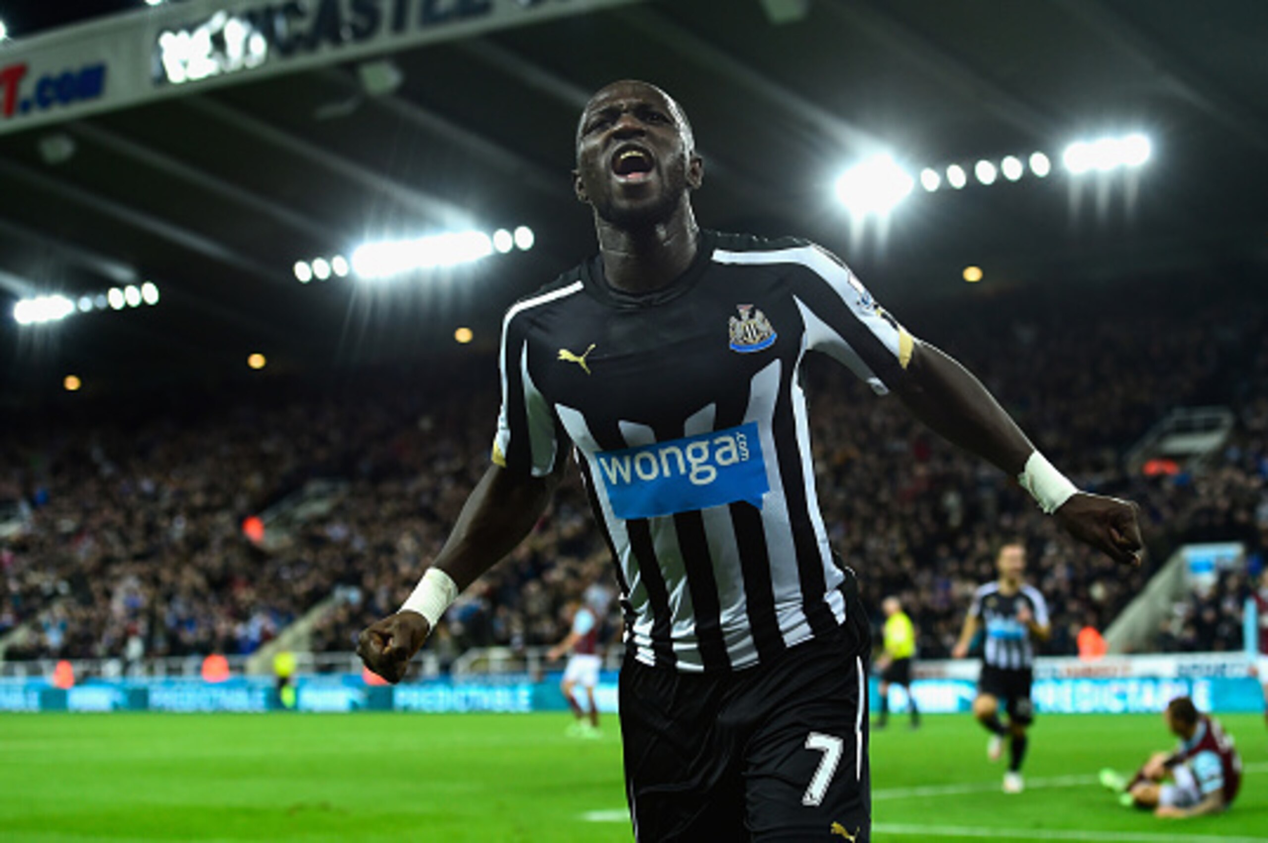 NEWCASTLE UPON TYNE, ENGLAND - JANUARY 01:  Newcastle United player Moussa Sissoko celebrates after scoring their third goal during the Barclays Premier League match between Newcastle United and Burnley at St James' Park on January 1, 2015 in Newcastle up