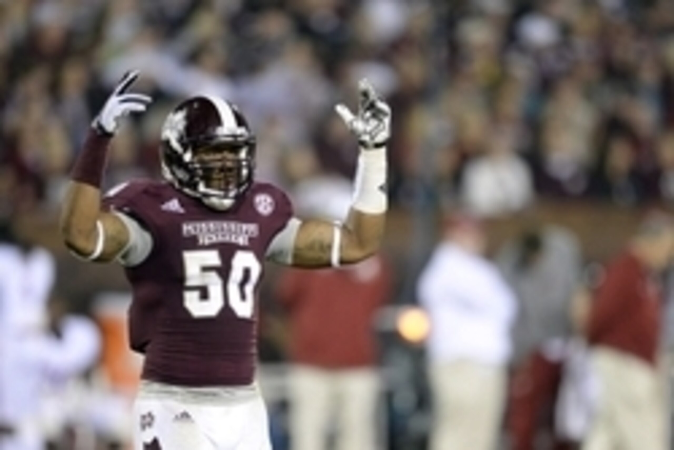Nov 16, 2013; Starkville, MS, USA; Mississippi State Bulldogs linebacker Benardrick McKinney (50) tries to pump up the crowd noise against the Alabama Crimson Tide during the first quarter at Davis Wade Stadium. Mandatory Credit: John David Mercer-USA TOD
