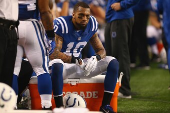 ARLINGTON, TX - DECEMBER 21:  Donte Moncrief #10 of the Indianapolis Colts watches play against the Dallas Cowboys in the fourth quarter at AT&T Stadium on December 21, 2014 in Arlington, Texas.  (Photo by Ronald Martinez/Getty Images)