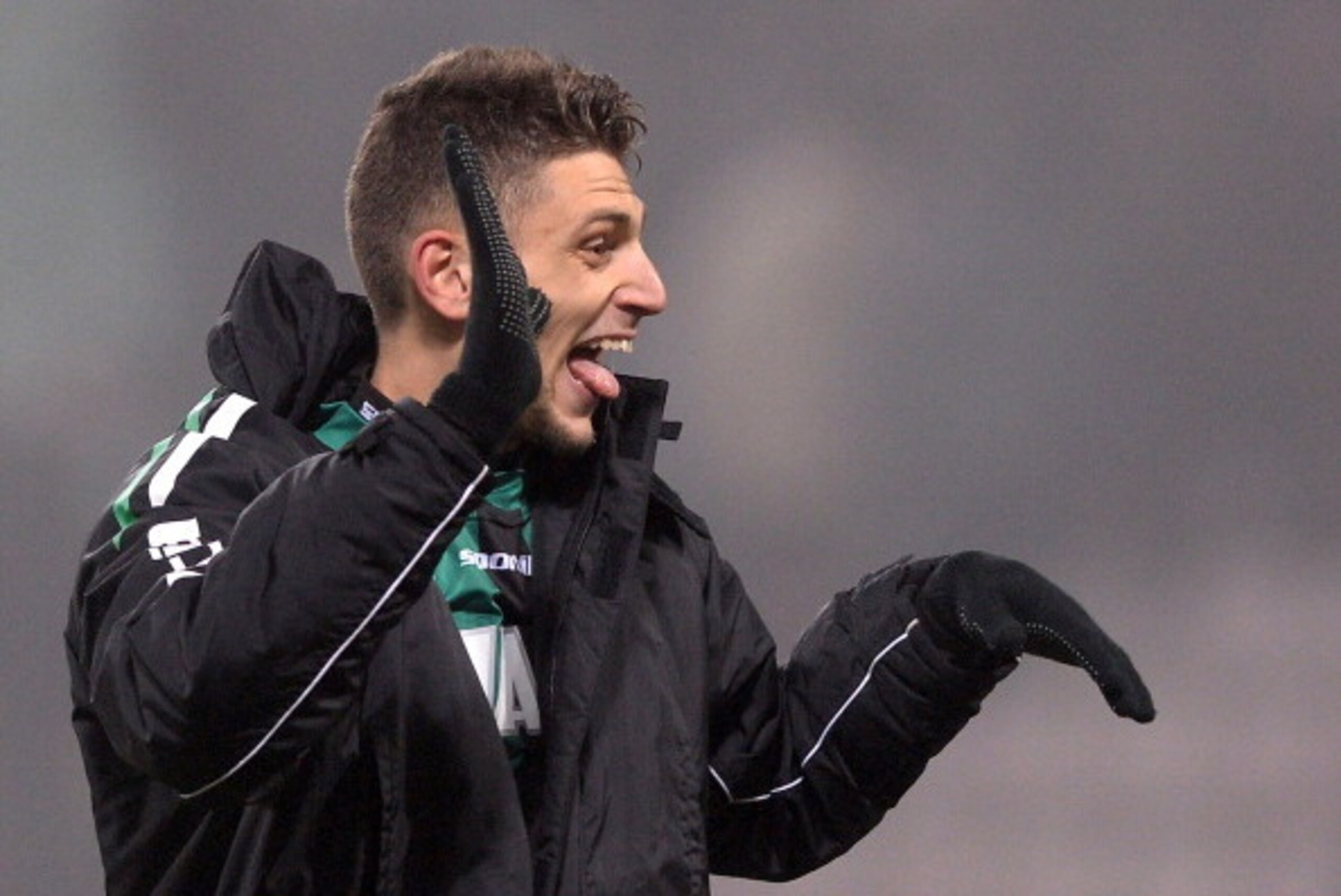 SASSUOLO, ITALY - JANUARY 12:  Domenico Berardi of US Sassuolo Calcio celebrates at the end of the Serie A match between US Sassuolo Calcio and AC Milan on January 12, 2014 in Sassuolo, Italy.  (Photo by Claudio Villa/Getty Images)