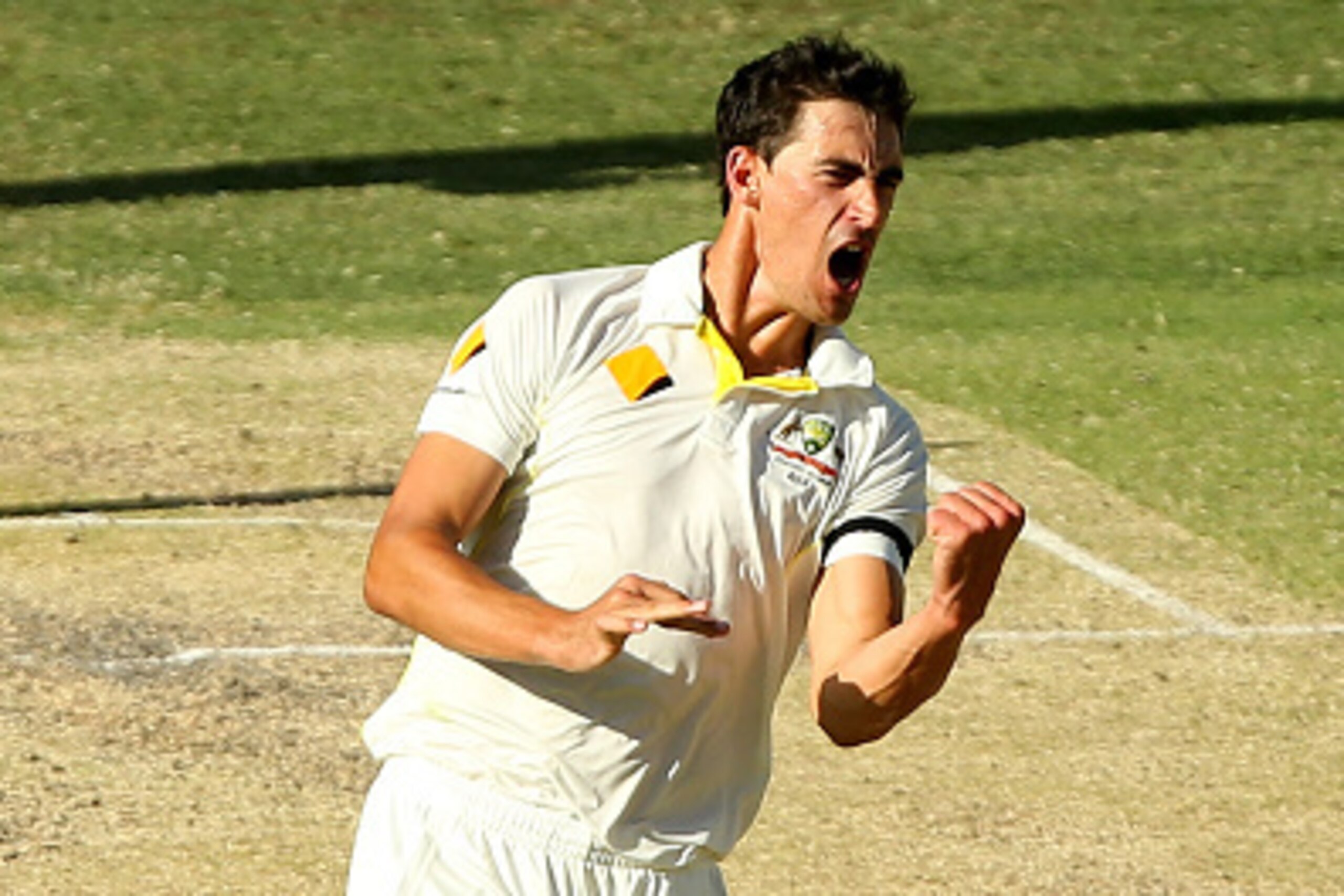 BRISBANE, AUSTRALIA - DECEMBER 19:  Mitchell Starc of Australia celebrates after dismissing Murali Vijay of India during day three of the 2nd Test match between Australia and India at The Gabba on December 19, 2014 in Brisbane, Australia.  (Photo by Chris