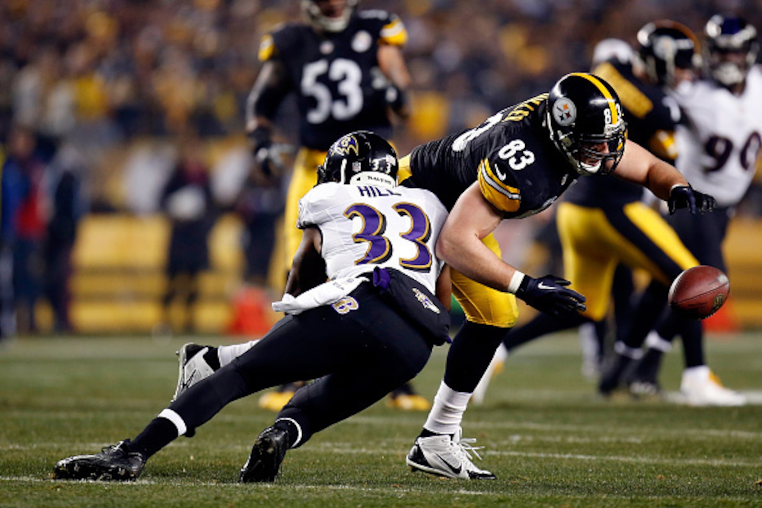 PITTSBURGH, PA - JANUARY 03:  Heath Miller #83 of the Pittsburgh Steelers fails to make a catch as  Will Hill #33 of the Baltimore Ravens defends during their AFC Wild Card game at Heinz Field on January 3, 2015 in Pittsburgh, Pennsylvania.  (Photo by Gre