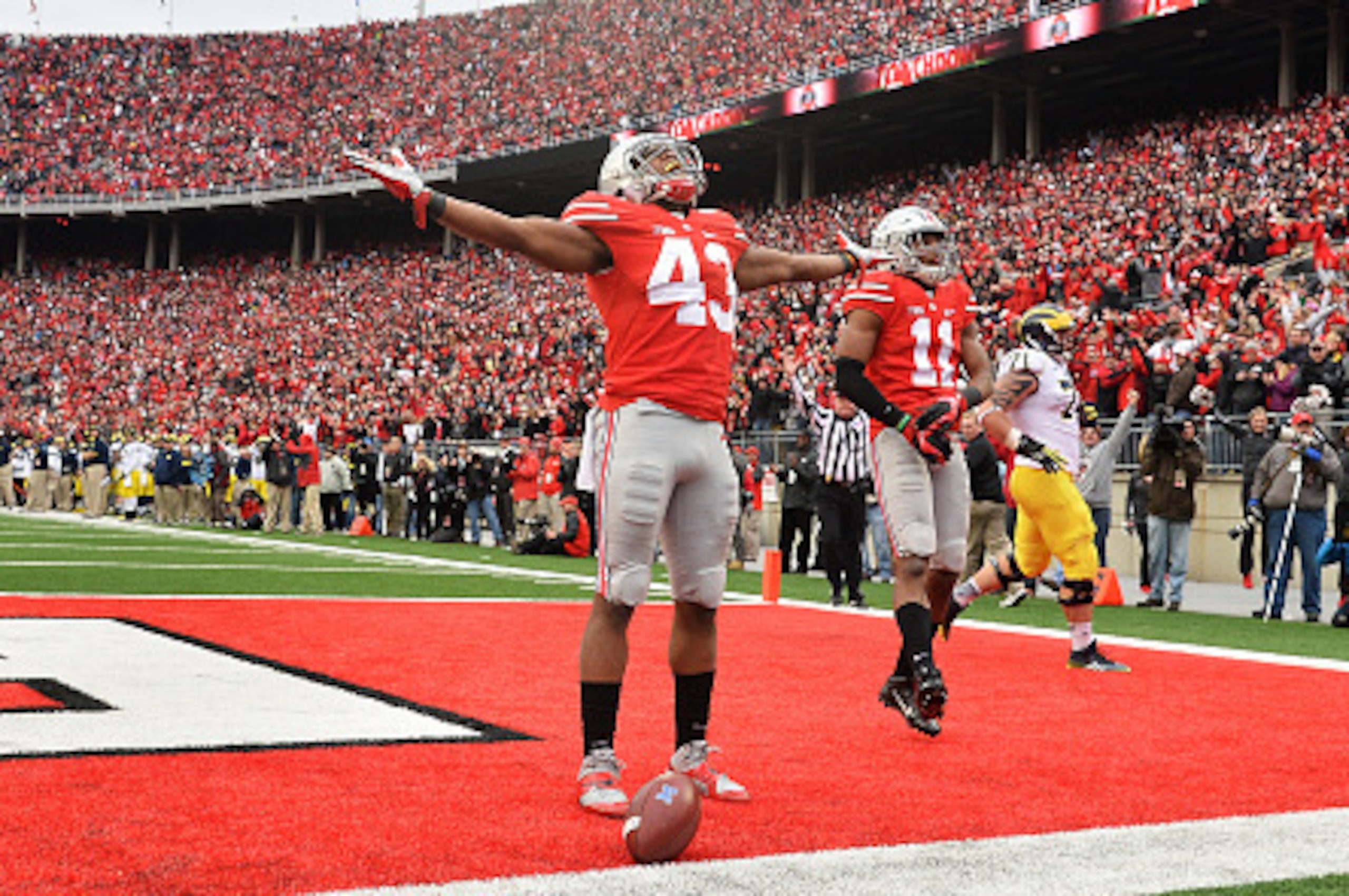 COLUMBUS, OH - NOVEMBER 29:  Darron Lee #43 of the Ohio State Buckeyes celebrates after returning a recovered fumble 33-yards for a touchdown in the fourth quarter against the Michigan Wolverines at Ohio Stadium on November 29, 2014 in Columbus, Ohio. Ohi