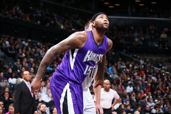BROOKLYN, NY - DECEMBER 29:  DeMarcus Cousins #15 of the Sacramento Kings boxes out against the Brooklyn Nets during the game on December 29, 2014 at Barclays Center in Brooklyn, New York. NOTE TO USER: User expressly acknowledges and agrees that, by down