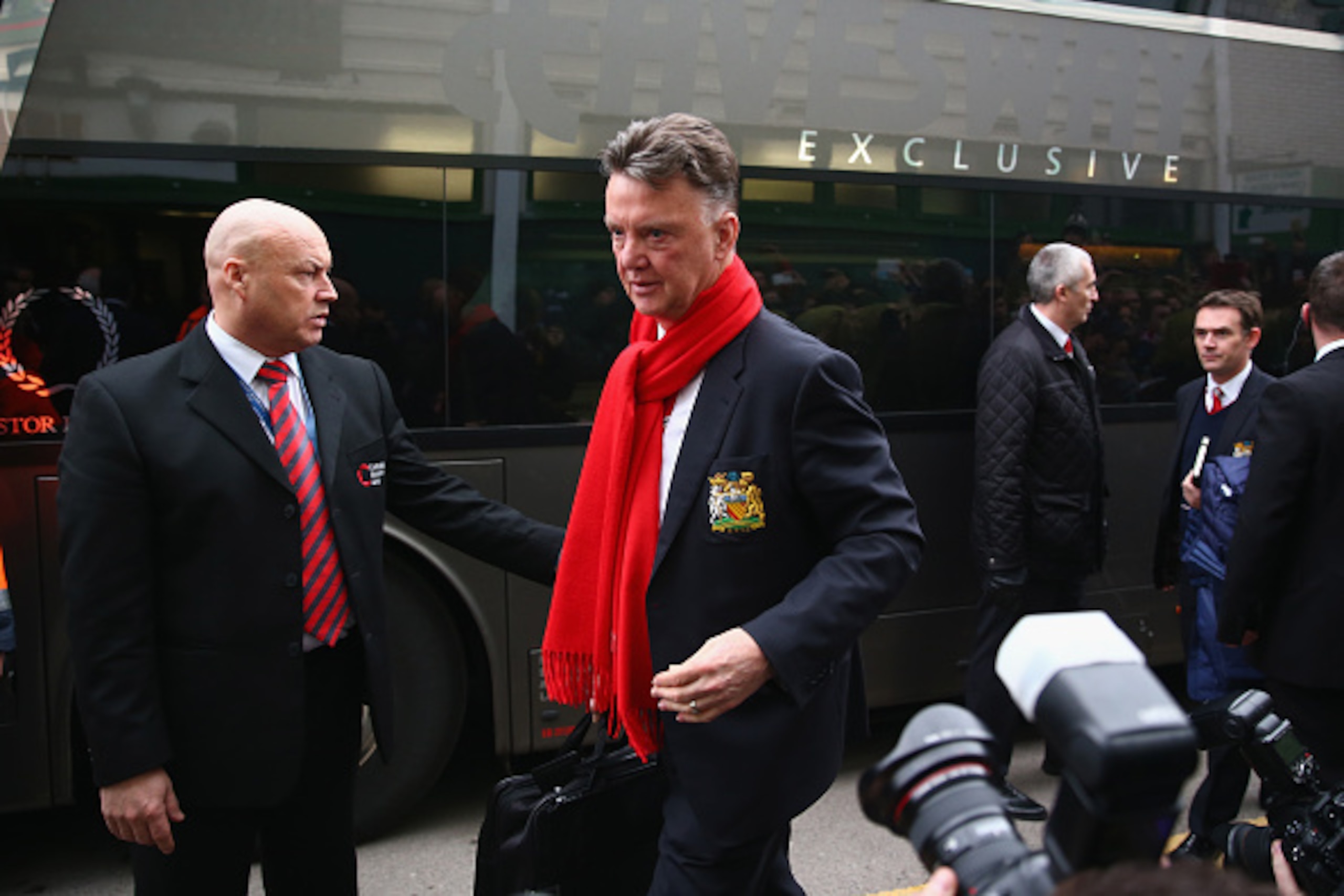 YEOVIL, ENGLAND - JANUARY 04: Louis Van Gaal the manager of Manchester United is ushered by stewards as he arrives ahead of the FA Cup Third Round match between Yeovil Town and Manchester United at Huish Park on January 4, 2015 in Yeovil, England. (Phot YEOVIL, ENGLAND - JANUARY 04: Louis Van Gaal the manager of Manchester United is ushered by stewards as he arrives ahead of the FA Cup Third Round match between Yeovil Town and Manchester United at Huish Park on January 4, 2015 in Yeovil, England. (Phot