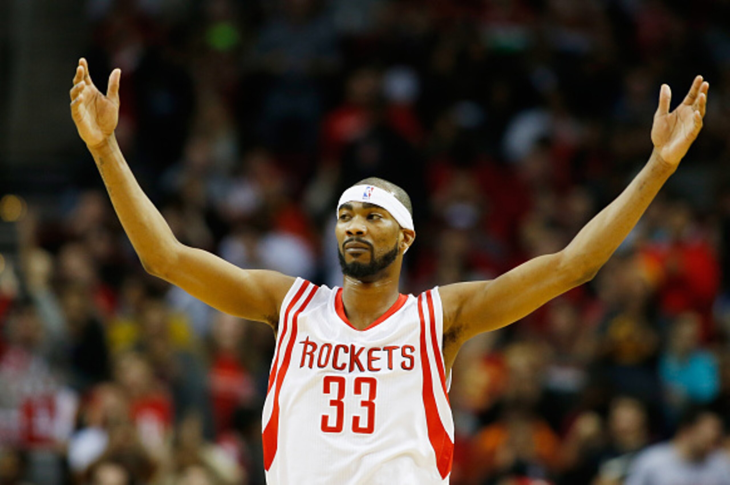 HOUSTON, TX - JANUARY 3:  Corey Brewer #33 of the Houston Rockets celebrates a three-point basket during their game against the Miami Heat at the Toyota Center on January 3, 2015 in Houston, Texas.  NOTE TO USER: User expressly acknowledges and agrees tha