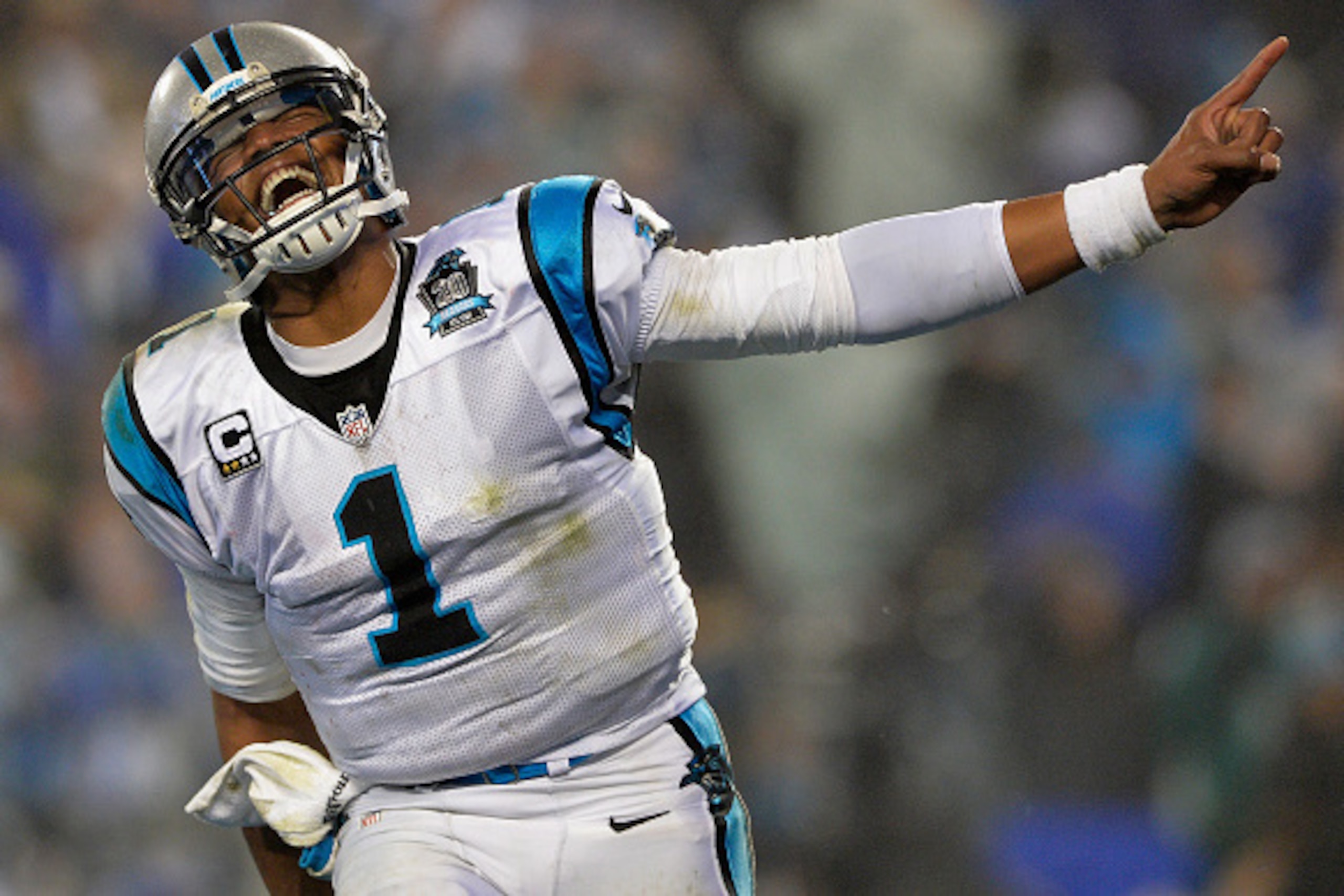 CHARLOTTE, NC - JANUARY 03:  Cam Newton #1 of the Carolina Panthers celebrates during their NFC Wild Card Playoff game against the Arizona Cardinals at Bank of America Stadium on January 3, 2015 in Charlotte, North Carolina.  (Photo by Grant Halverson/Get