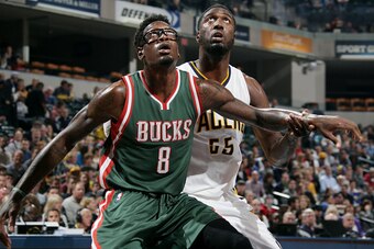 INDIANAPOLIS, IN - NOVEMBER 4: Larry Sanders #8 of the Milwaukee Bucks battles for position against Roy Hibbert #55 of the Indiana Pacers at Bankers Life Fieldhouse on November 4, 2014 in Indianapolis, Indiana. NOTE TO USER: User expressly acknowledges an