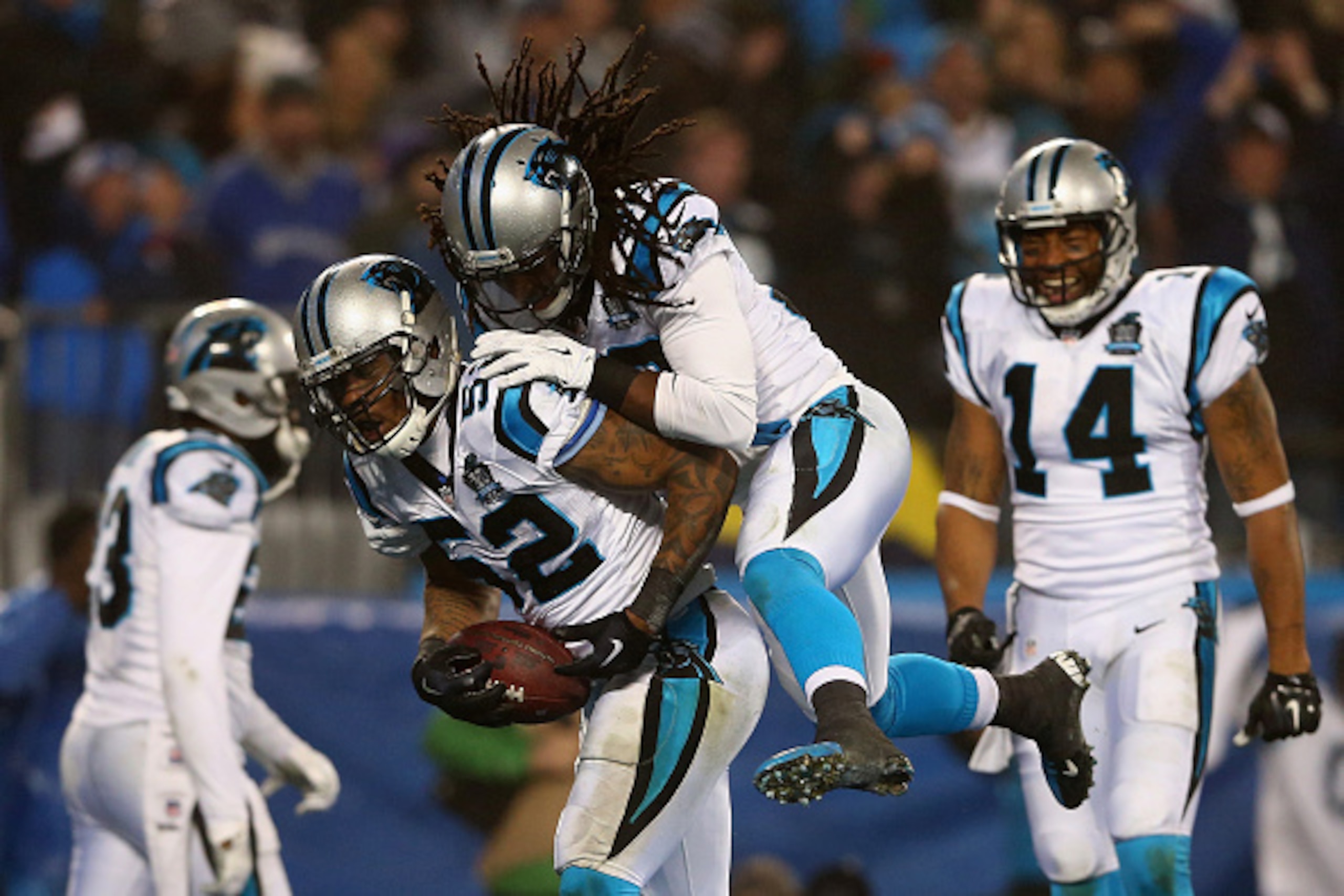 CHARLOTTE, NC - JANUARY 03:  Kevin Reddick #52 of the Carolina Panthers celebrates a fumble recovery against the Arizona Cardinals in the 2nd half during their NFC Wild Card Playoff game at Bank of America Stadium on January 3, 2015 in Charlotte, North Ca