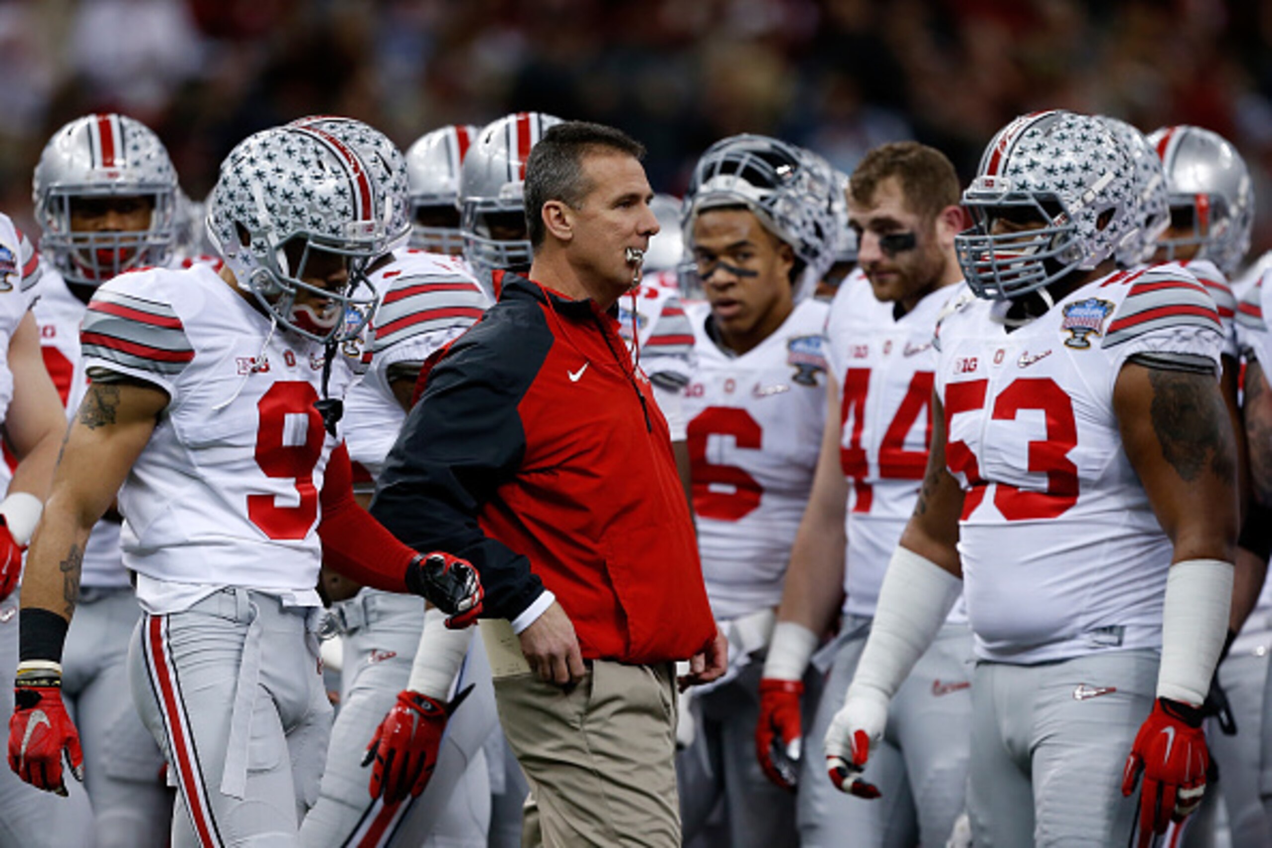 NEW ORLEANS, LA - JANUARY 01:  Head coach Urban Meyer of the Ohio State Buckeyes looks on from the sidelines during the All State Sugar Bowl at the Mercedes-Benz Superdome on January 1, 2015 in New Orleans, Louisiana.  (Photo by Sean Gardner/Getty Images)