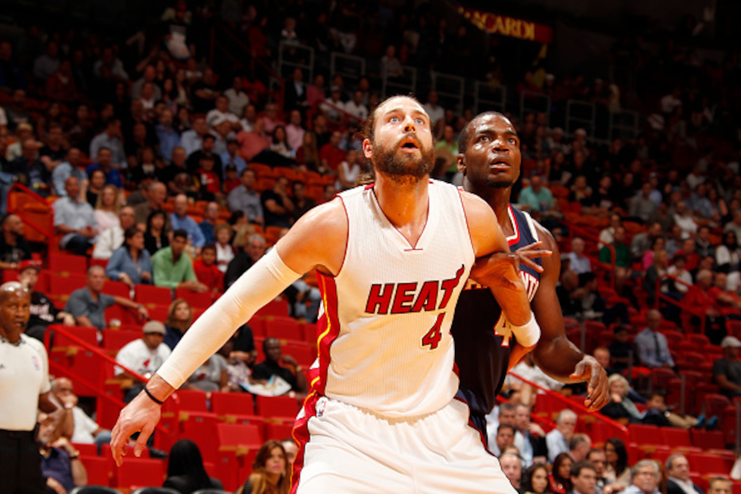 MIAMI, FL - December 3: Josh McRoberts #4 of the Miami Heat looks for the ball against the Atlanta Hawks during the game on December 3, 2014 at American Airlines Arena in Miami, Florida. NOTE TO USER: User expressly acknowledges and agrees that, by downlo