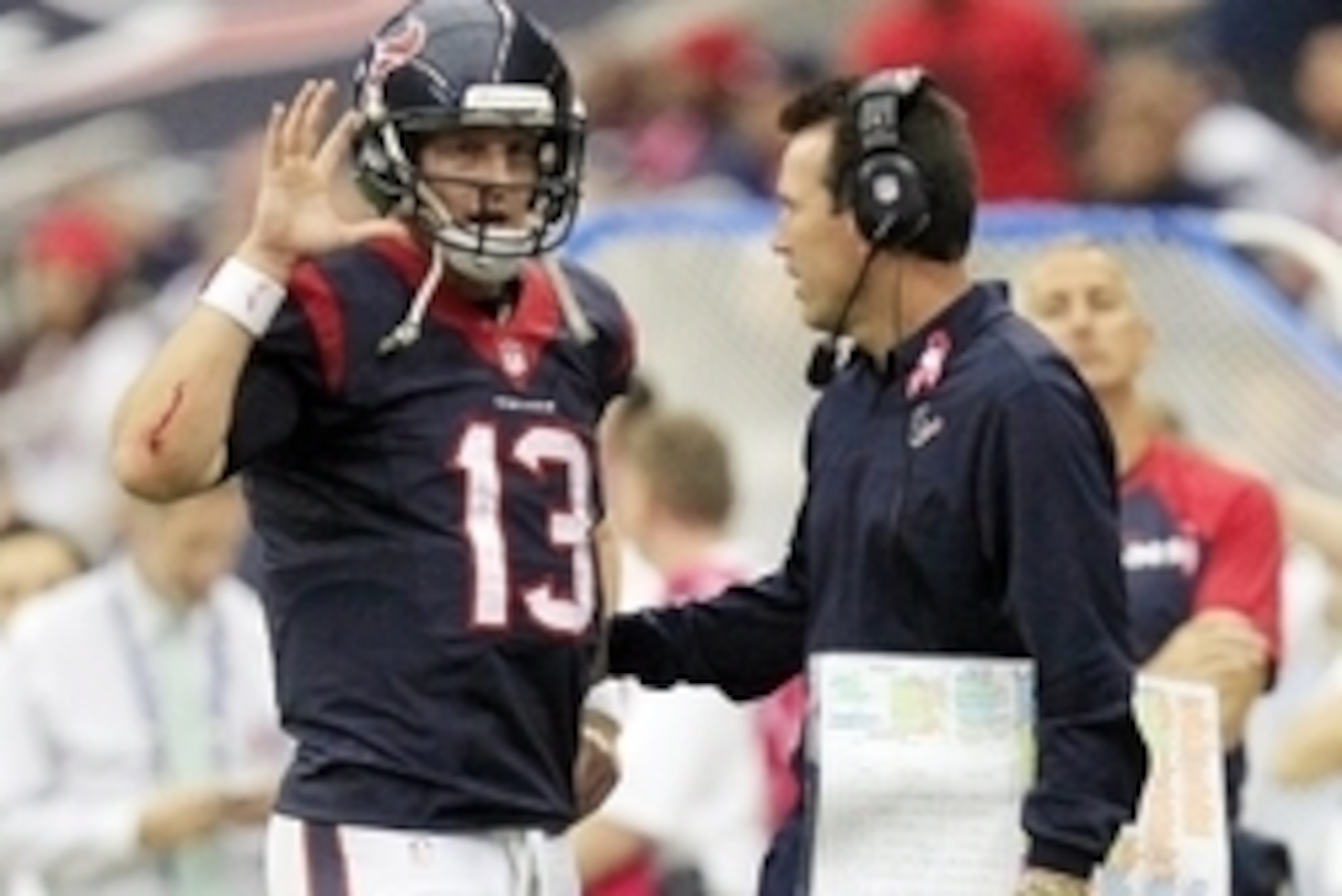 Oct 13, 2013; Houston, TX, USA; Houston Texans quarterback T.J. Yates (13) talks to head coach Gary Kubiak after throwing his second interception against the St. Louis Rams during the second half at Reliant Stadium. The Rams won 38-13. Mandatory Credit: T