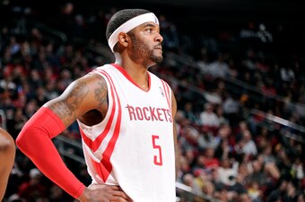 HOUSTON, TX -  DECEMBER 29: Josh Smith #5 of the Houston Rockets stands on the court during a game against the Washington Wizards on December 29, 2014 at Toyota Center in Houston, Texas. NOTE TO USER: User expressly acknowledges and agrees that, by downlo