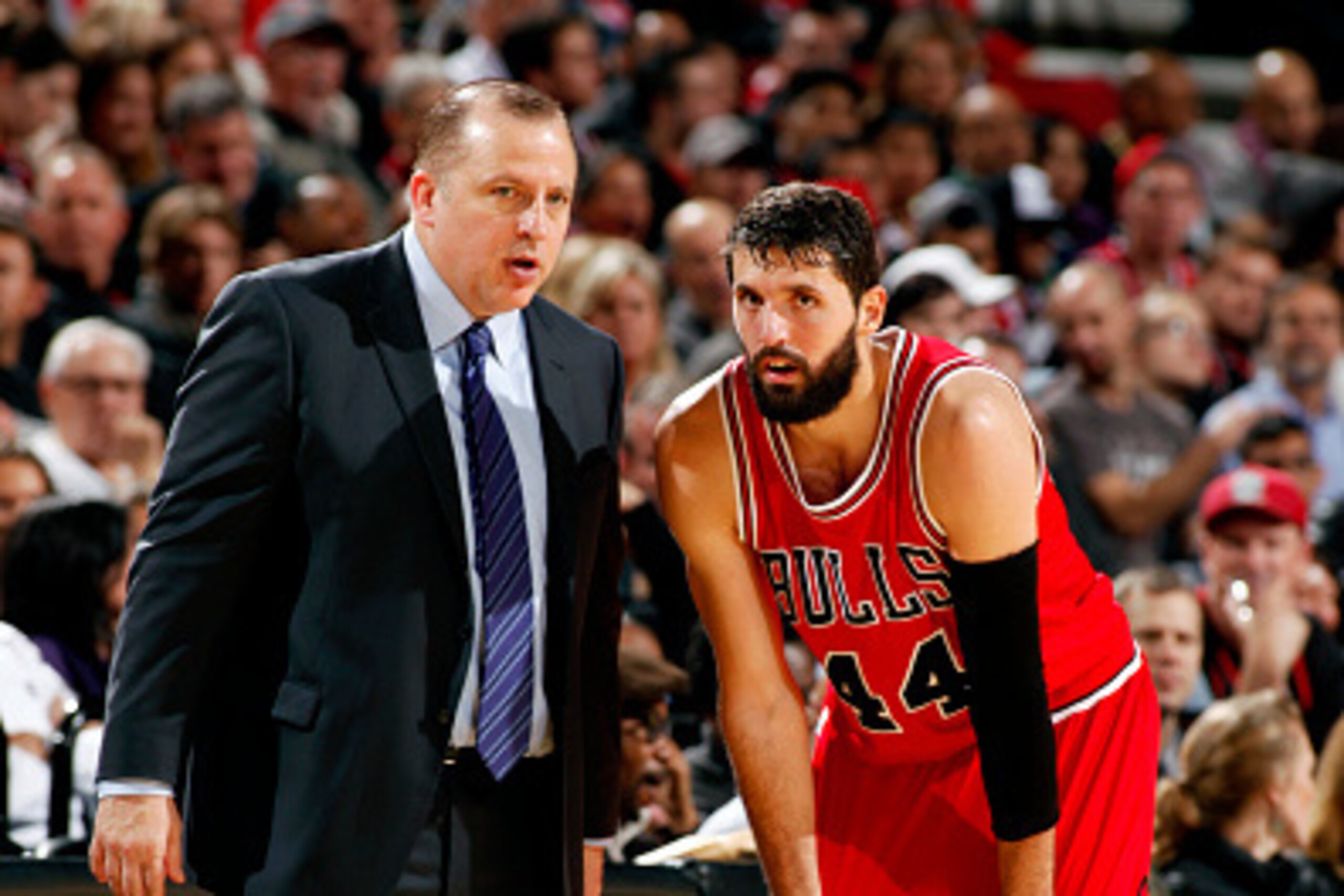 PORTLAND, OR - NOVEMBER 21: Tom Thibodeau and Nikola Mirotic #44 of the Chicago Bulls speak during a game against the Portland Trail Blazers on November 21, 2014 at the Moda Center Arena in Portland, Oregon. NOTE TO USER: User expressly acknowledges and a