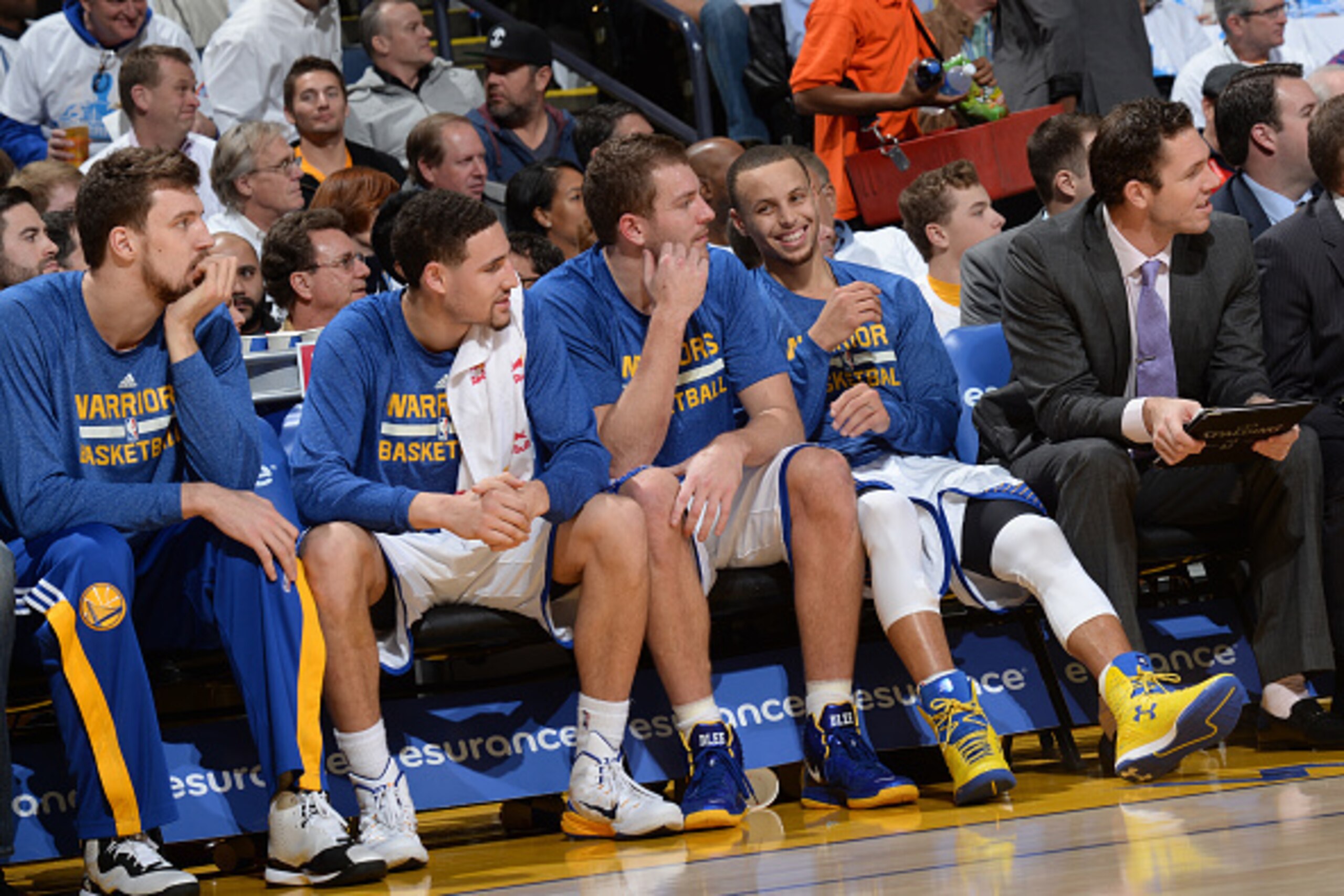 OAKLAND, CA - JANUARY 5: Klay Thompson #11, David Lee #10 and Stephen Curry #30 of the Golden State Warriors during the game against the Oklahoma City Thunder on January 5, 2015 at Oracle Arena in Oakland, California. NOTE TO USER: User expressly acknowl OAKLAND, CA - JANUARY 5: Klay Thompson #11, David Lee #10 and Stephen Curry #30 of the Golden State Warriors during the game against the Oklahoma City Thunder on January 5, 2015 at Oracle Arena in Oakland, California. NOTE TO USER: User expressly acknowl