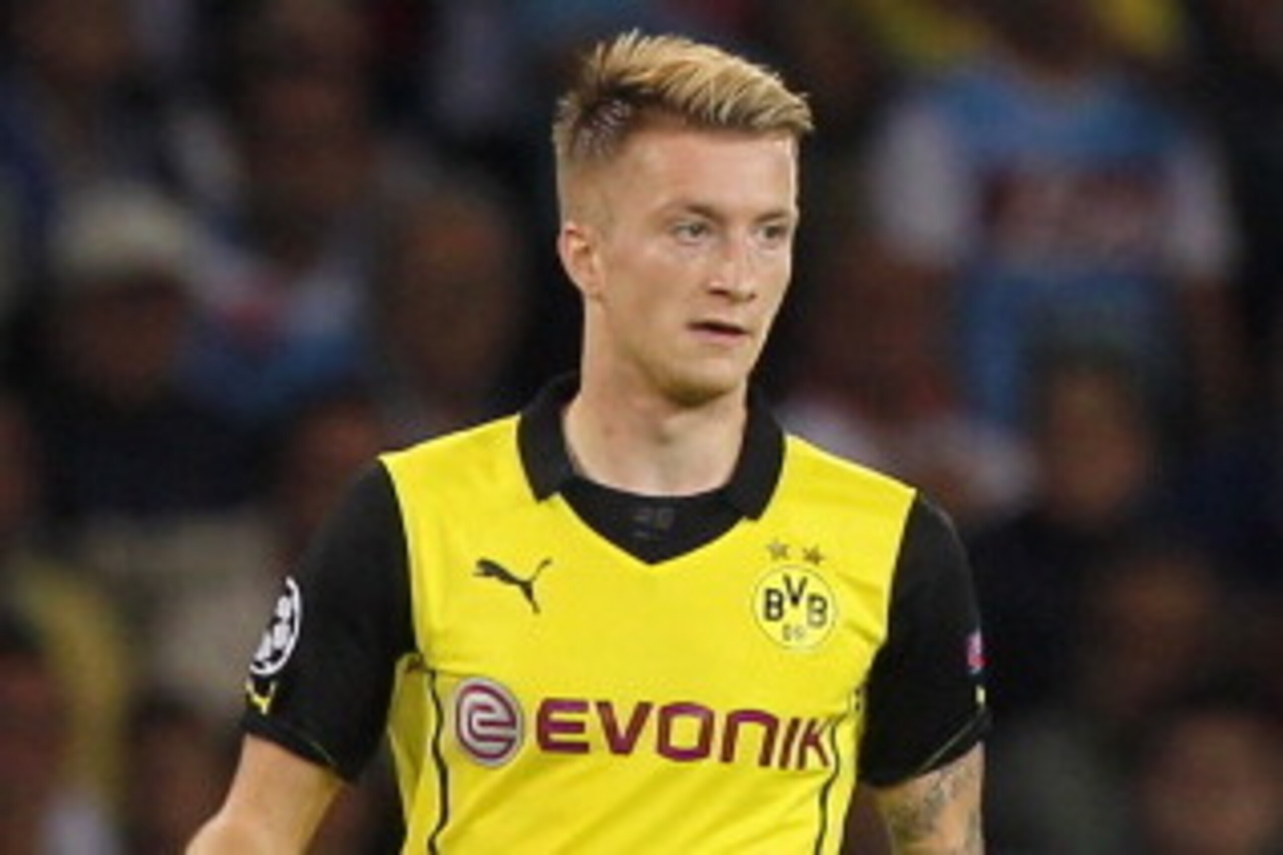NAPLES, ITALY - SEPTEMBER 18:  Marco Reus of Borussia Dortmund in action during the Uefa Champions League Group F match between Napoli and Borussia Dortmund at Stadio San Paolo on September 18, 2013 in Naples, Italy.  (Photo by Paolo Bruno/Getty Images)