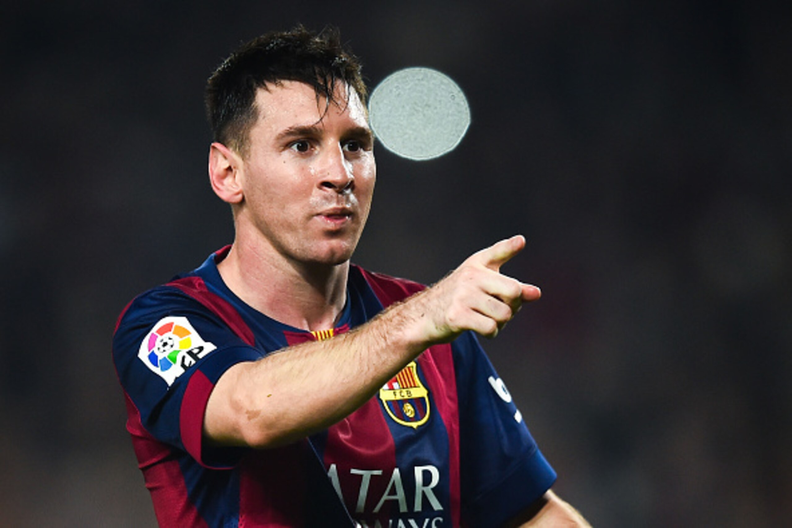 BARCELONA, SPAIN - NOVEMBER 22:  Lionel Messi of FC Barcelona celebrates  after scoring his team's fourth goal during the La Liga match between FC Barcelona and Sevilla FC at Camp Nou on November 22, 2014 in Barcelona, Spain. Lionel Messi beat the record 